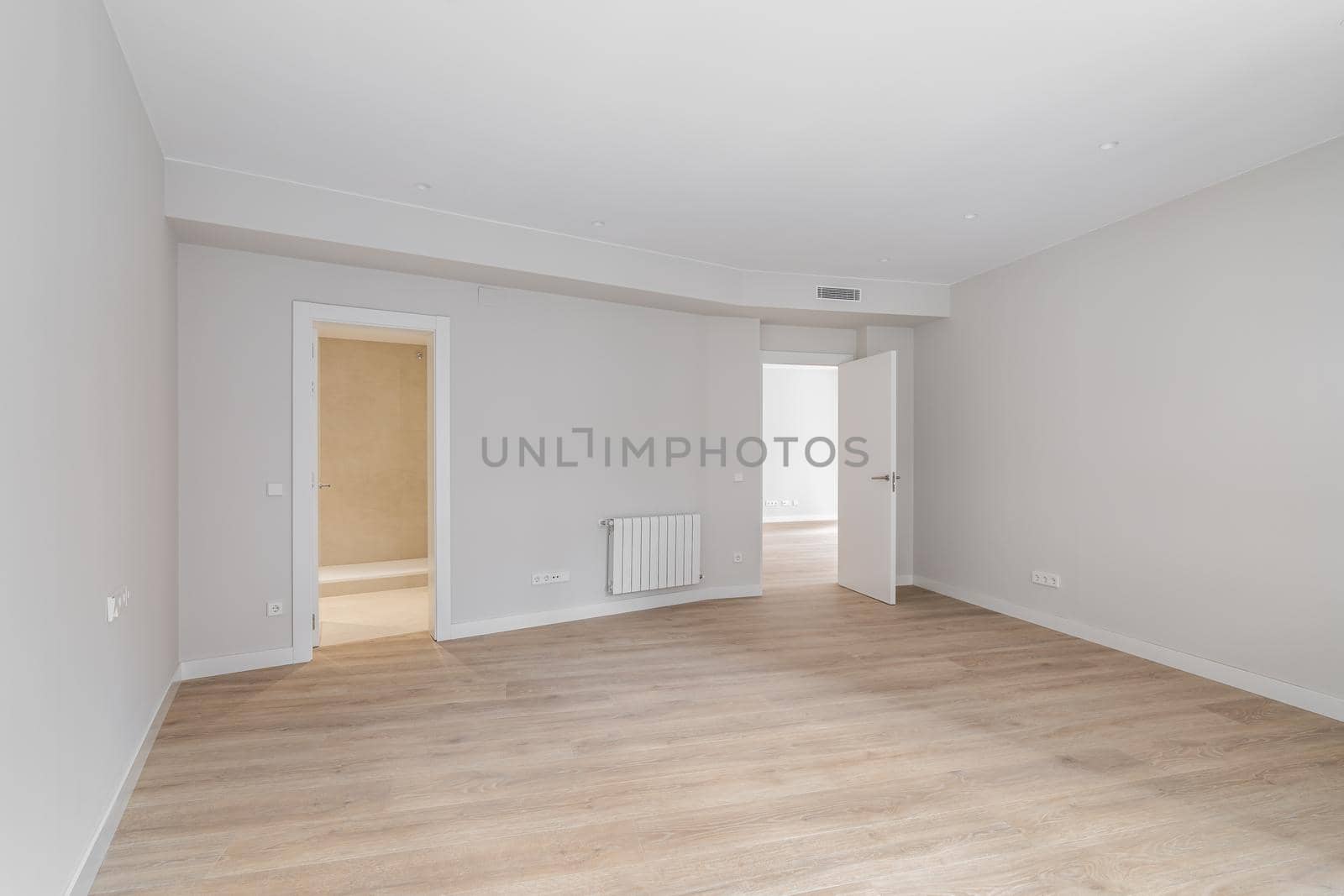 Modern and empty contemporary interior. White walls and doors in new apartment