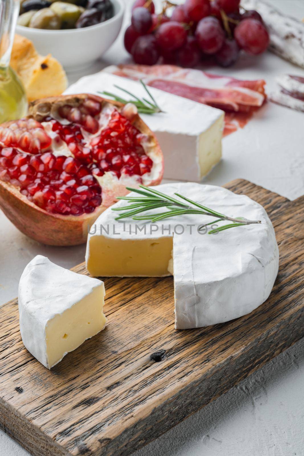French soft camembert of normandy cheese set, on white background