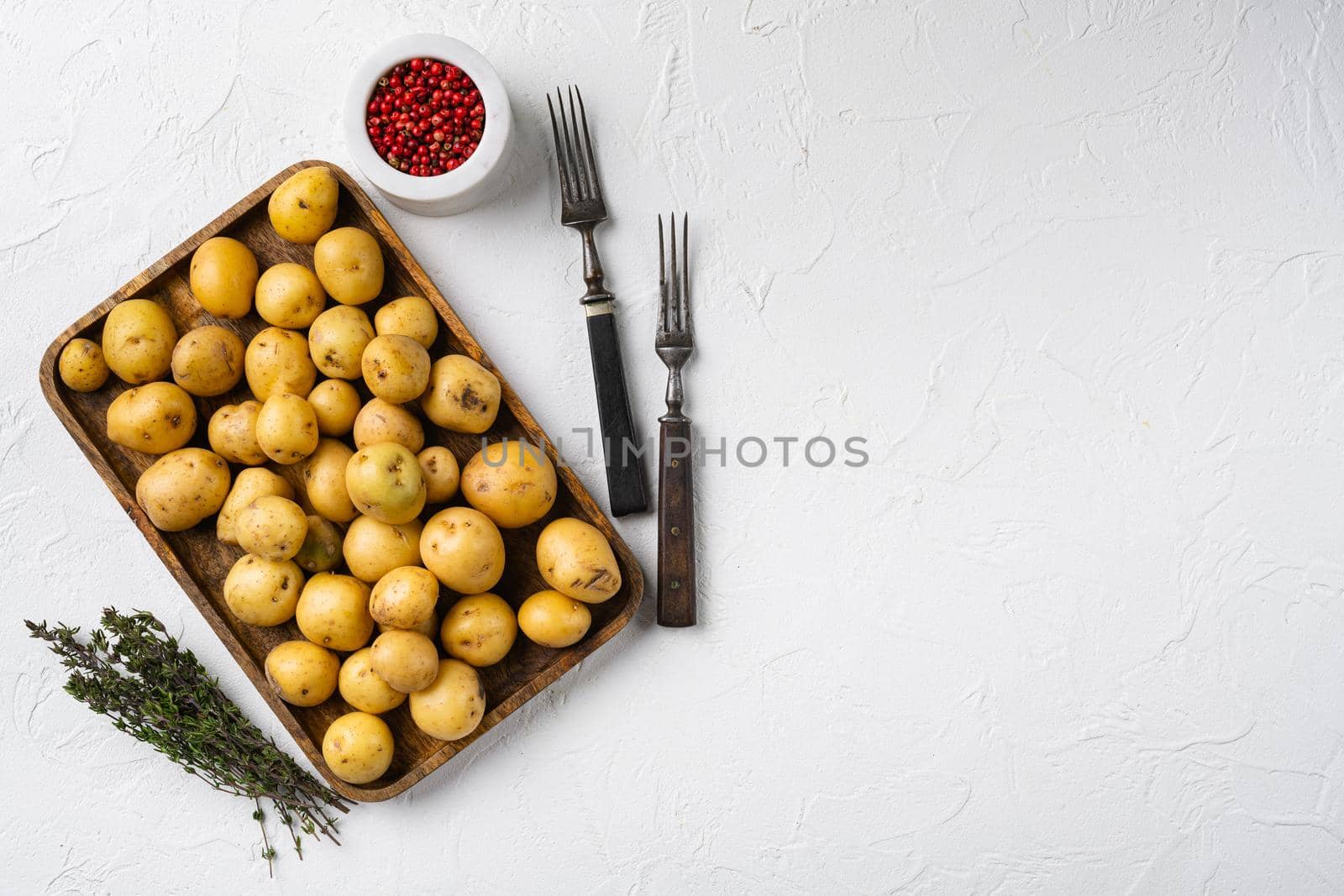 Baby potato set, on white stone table background, top view flat lay, with copy space for text by Ilianesolenyi