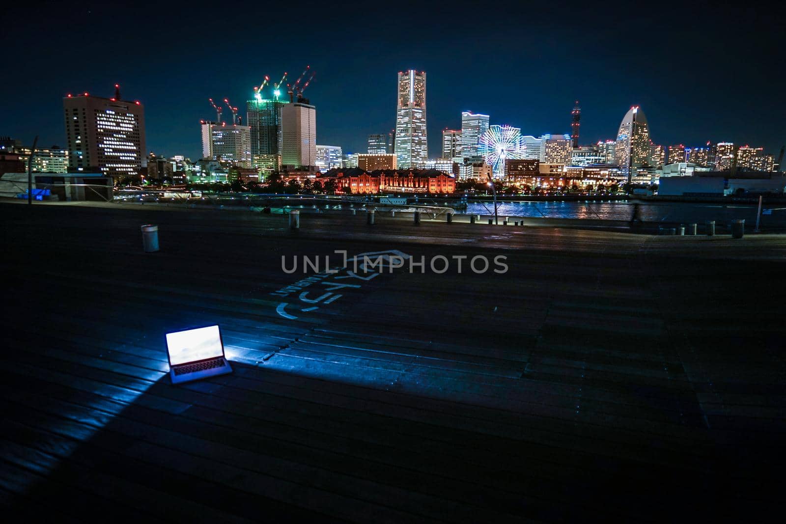 Yokohama Night View and Laptop (Image of Nomad Walker). Shooting Location: Yokohama-city kanagawa prefecture