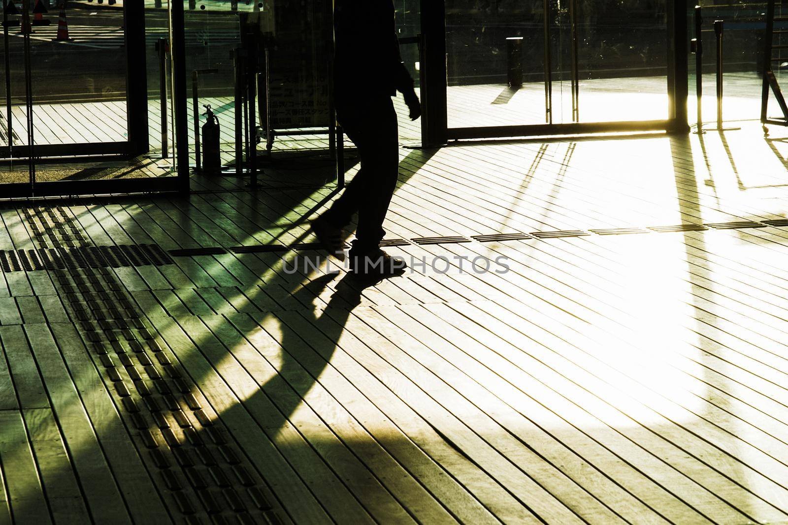 Shadow of people walking wood deck. Shooting Location: Yokohama-city kanagawa prefecture