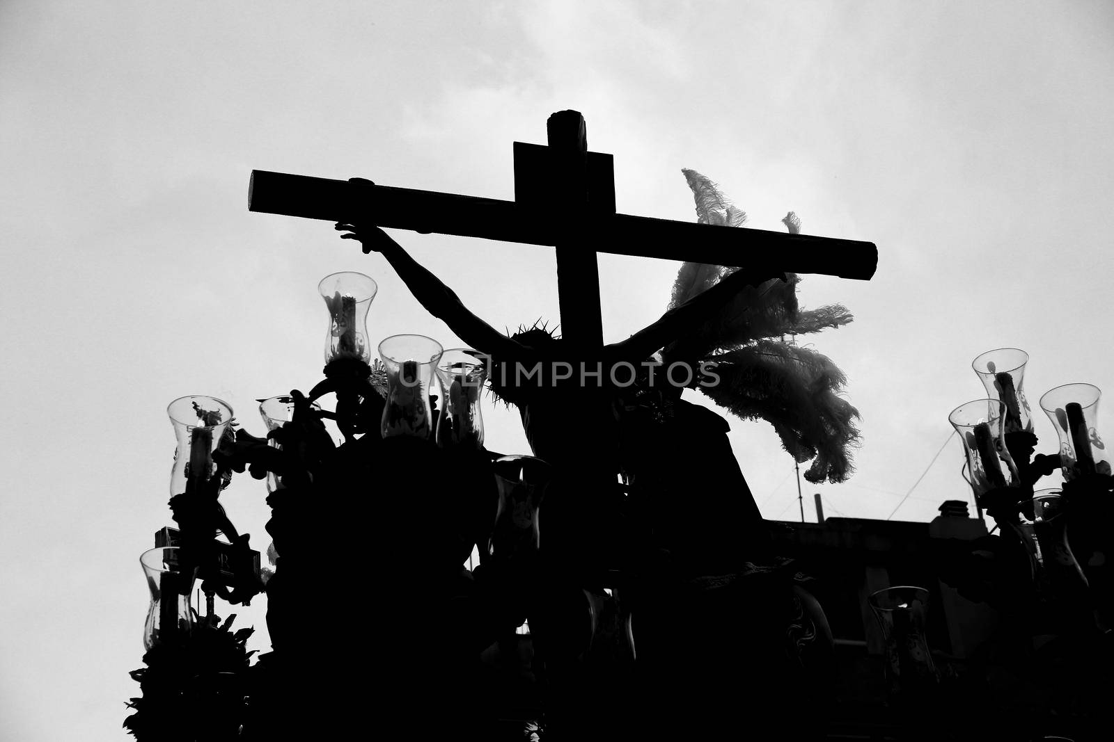 Elche, Spain- April 13, 2022: Easter Parade with bearers and penitents through the streets of Elche city in the Holy Week