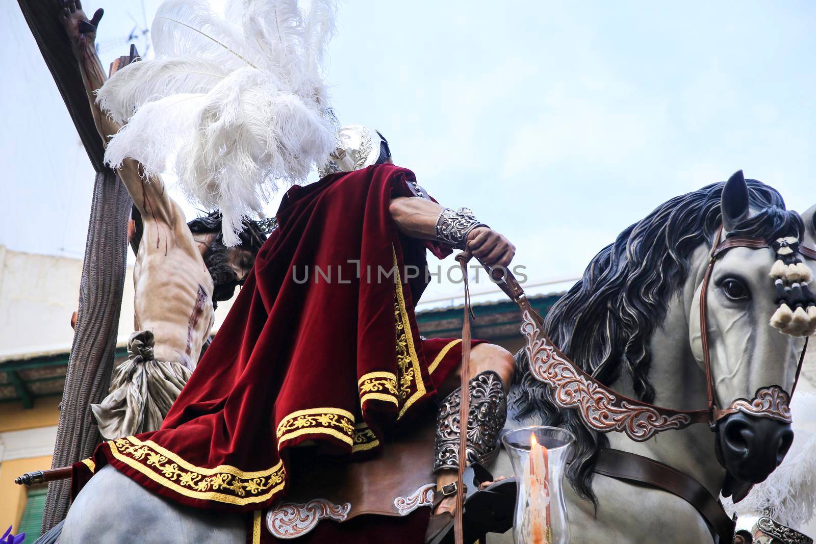 Elche, Spain- April 13, 2022: Easter Parade with bearers and penitents through the streets of Elche city in the Holy Week