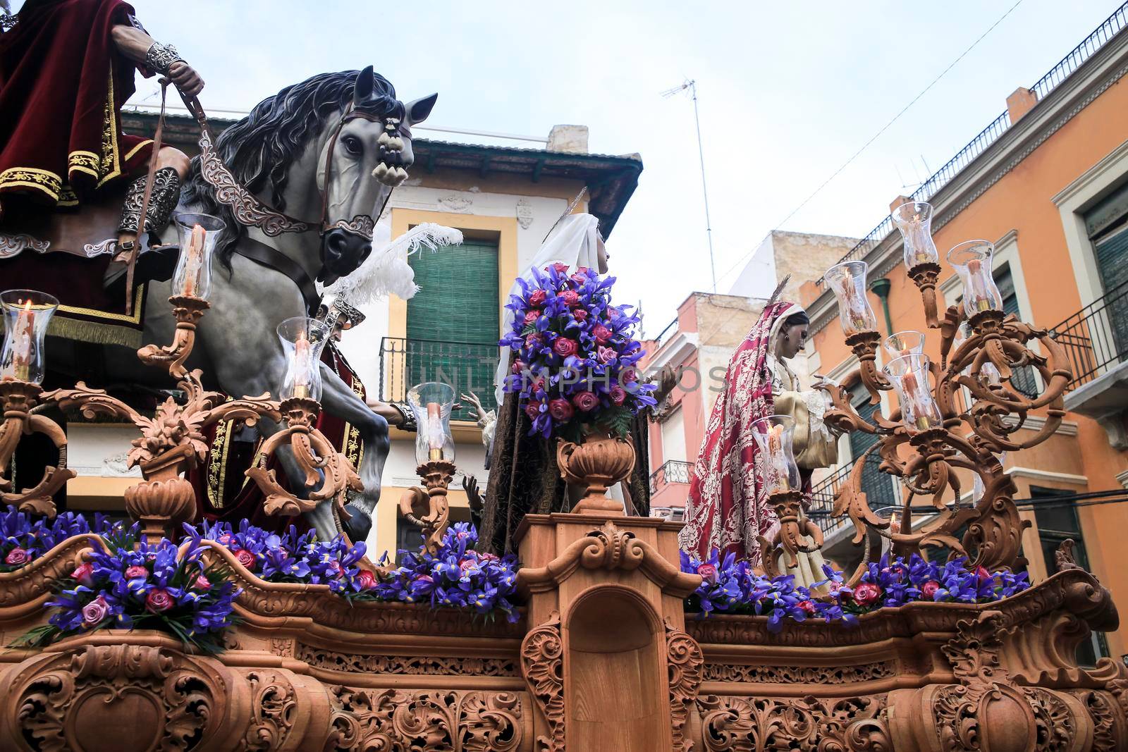 Elche, Spain- April 13, 2022: Easter Parade with bearers and penitents through the streets of Elche city in the Holy Week