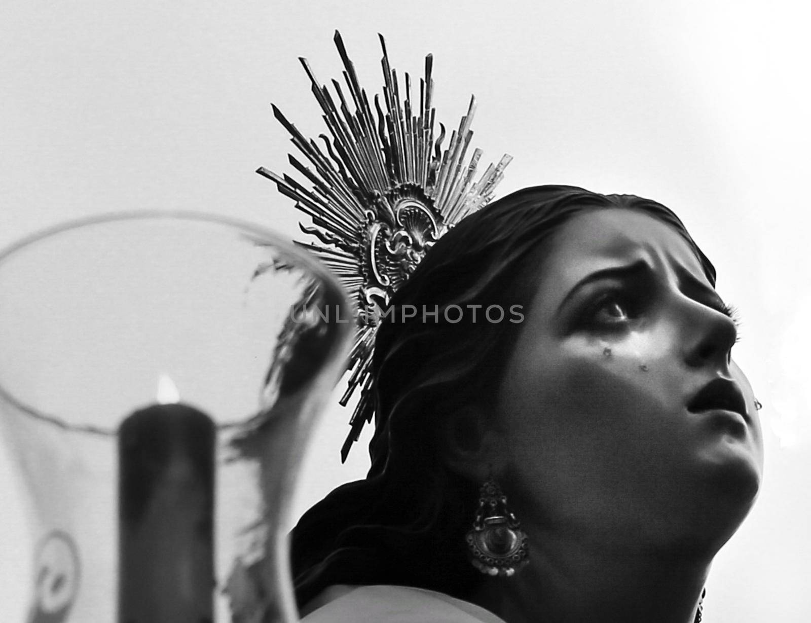 Elche, Spain- April 13, 2022: Virgin Mary on Easter Parade with bearers and penitents through the streets of Elche city in the Holy Week