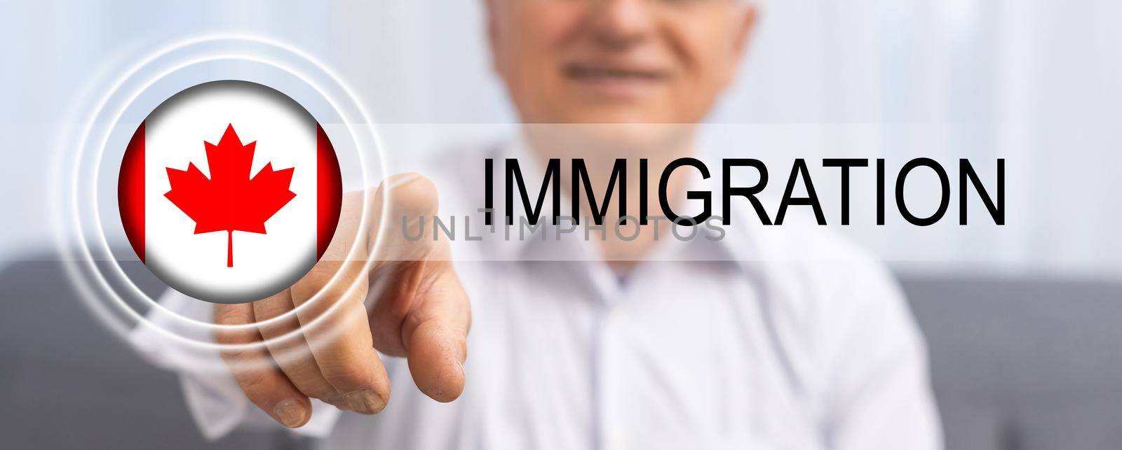 man with Canadian flag and word IMMIGRATION. virtual button.