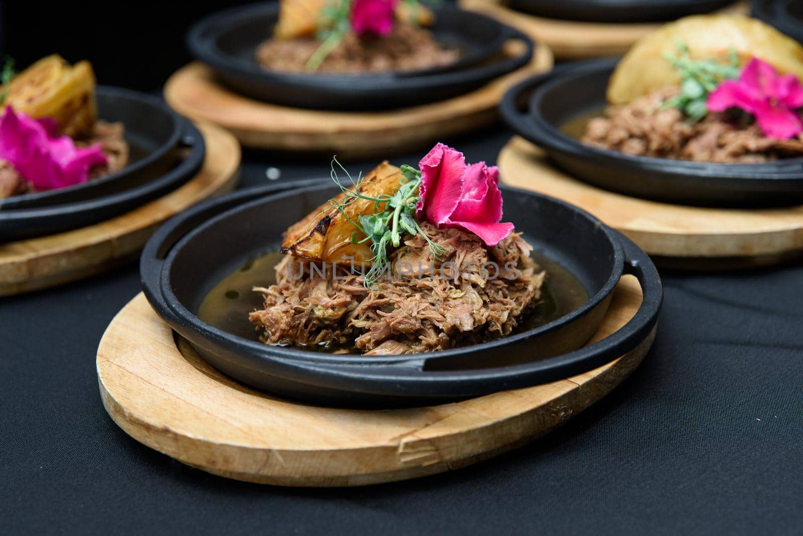 the chef prepares a tasty Swiss dish with venison and cabbage served with herbs and flower petals by Ashtray25