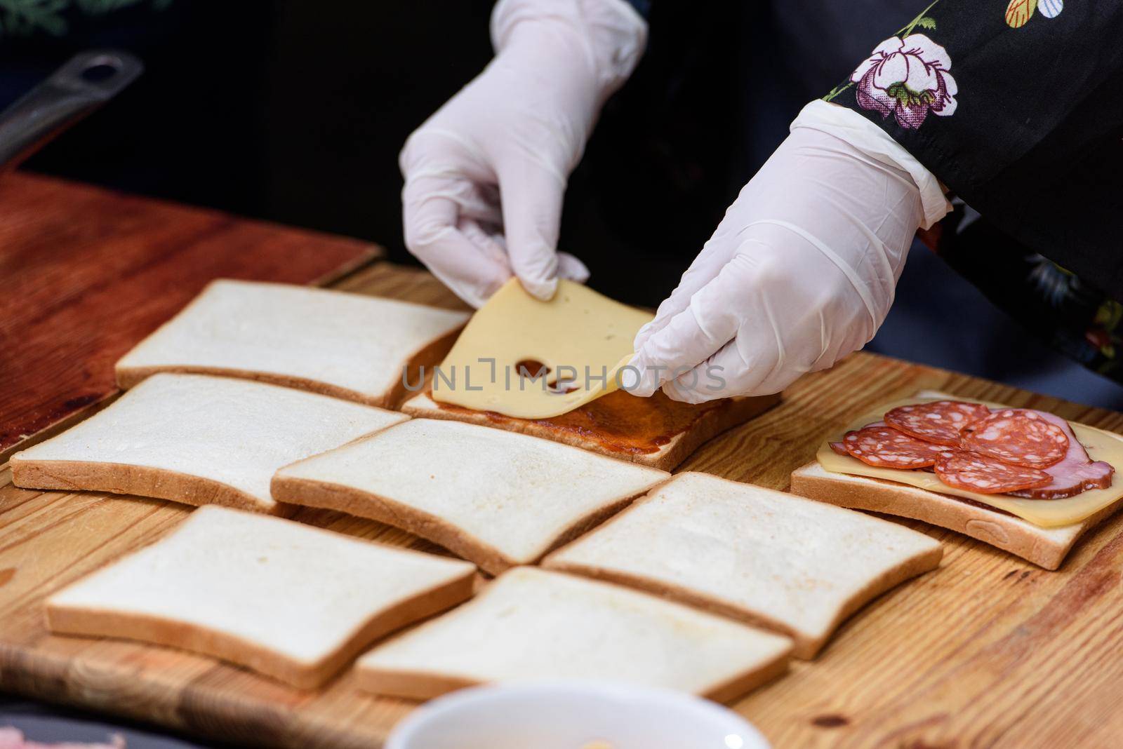 Francesinha, traditional Portuguese sandwich originally from Porto. National cuisine concept. the chef prepares a dish at restaurant by Ashtray25