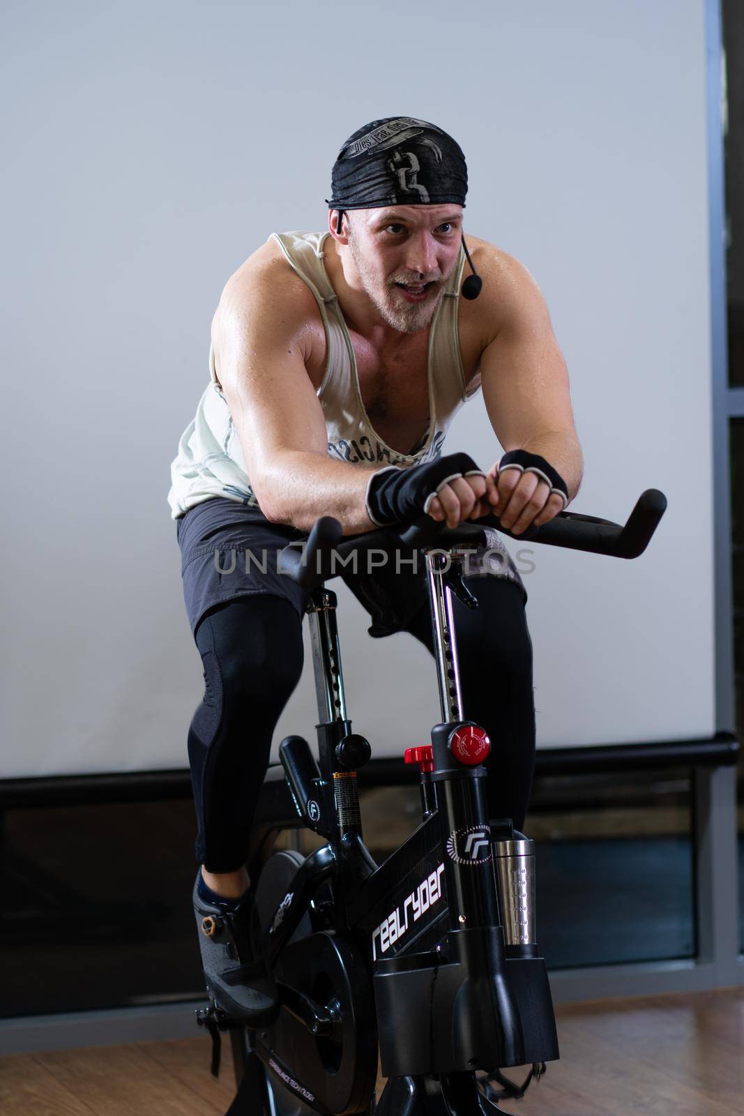 RUSSIA, MOSCOW - APR 09, 2022: bearded bike bicycle legs lifestyle healthy young workout, In the afternoon active health from shape for bodybuilder leg, biking adult. Pedal cycling,