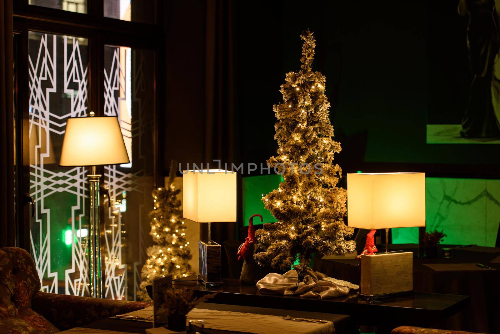 Christmas decoration in a restaurant. yellow lamps by Ashtray25