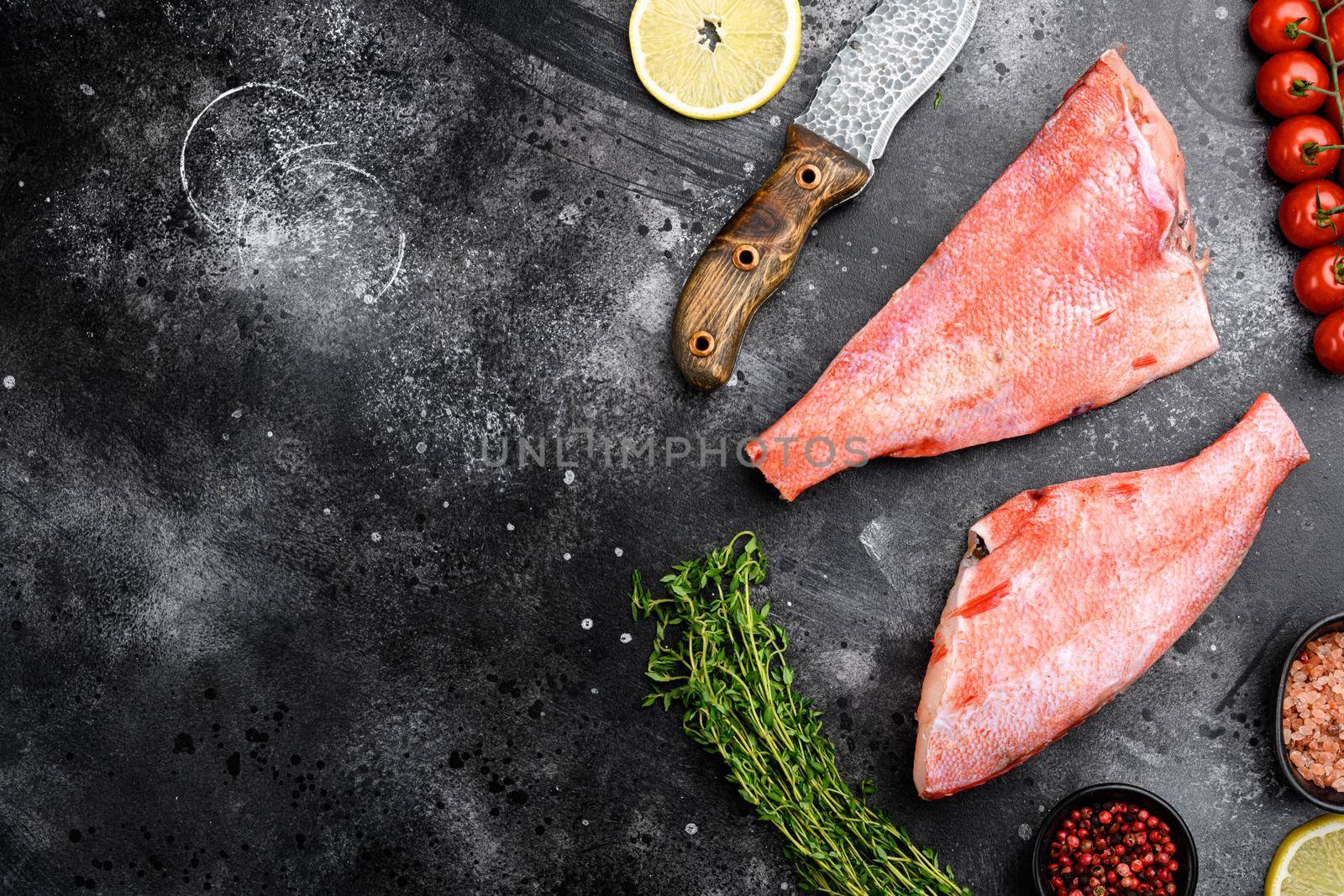 Sea perch set, on black dark stone table background, top view flat lay, with copy space for text