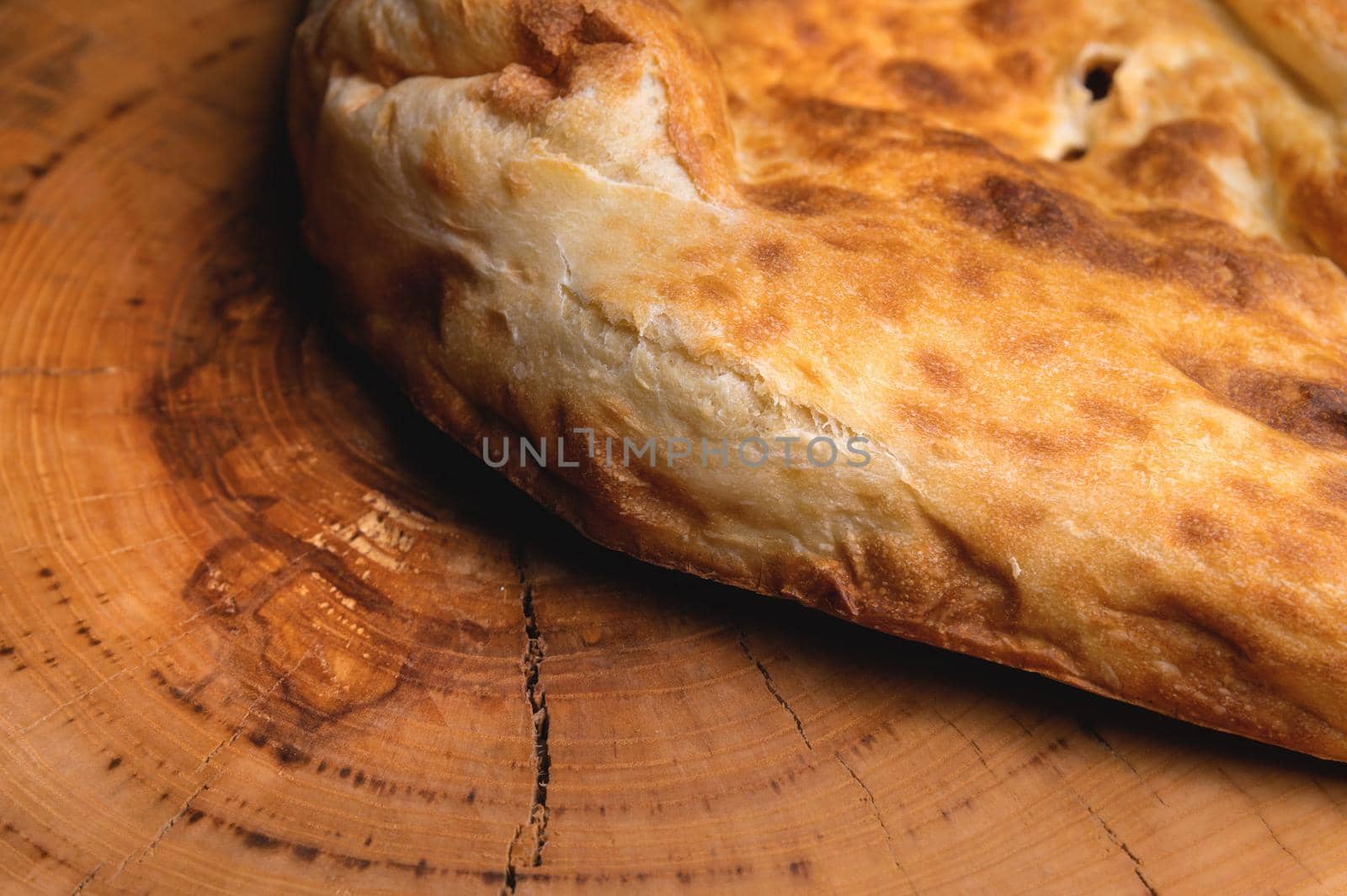 Close-up of fresh appetizing pita bread. delicious baked food.