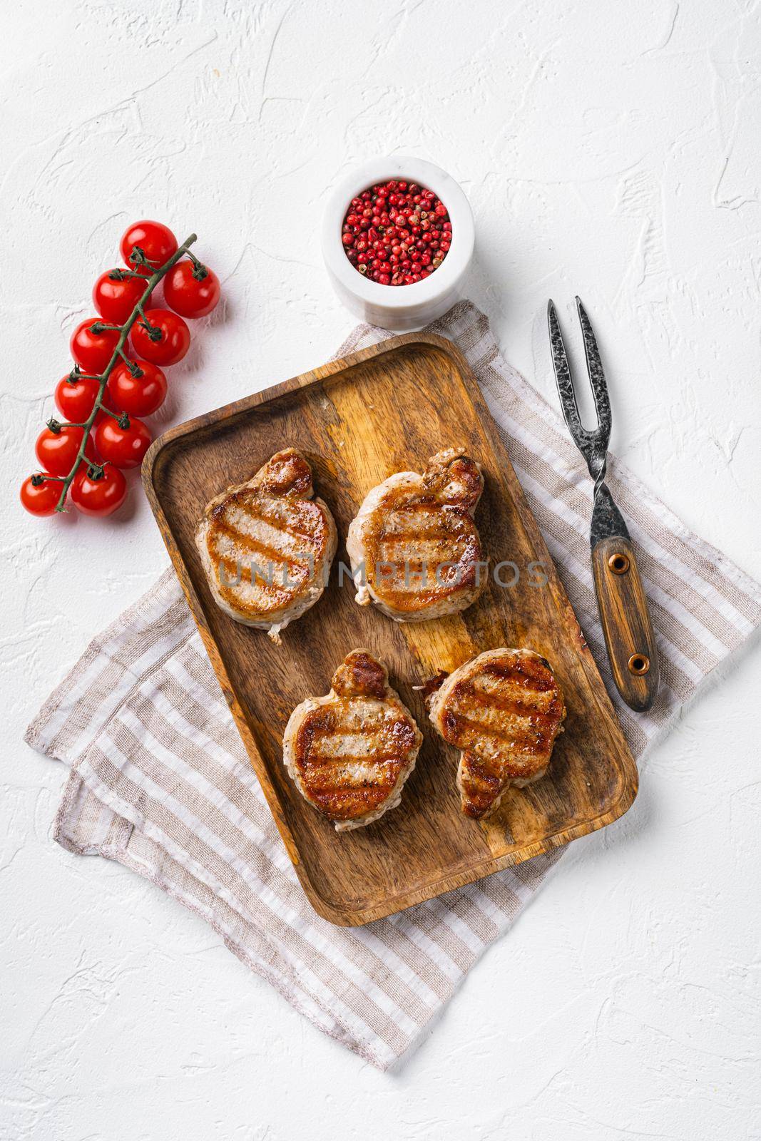 Fried pork fillet set, on white stone table background, top view flat lay, with copy space for text by Ilianesolenyi