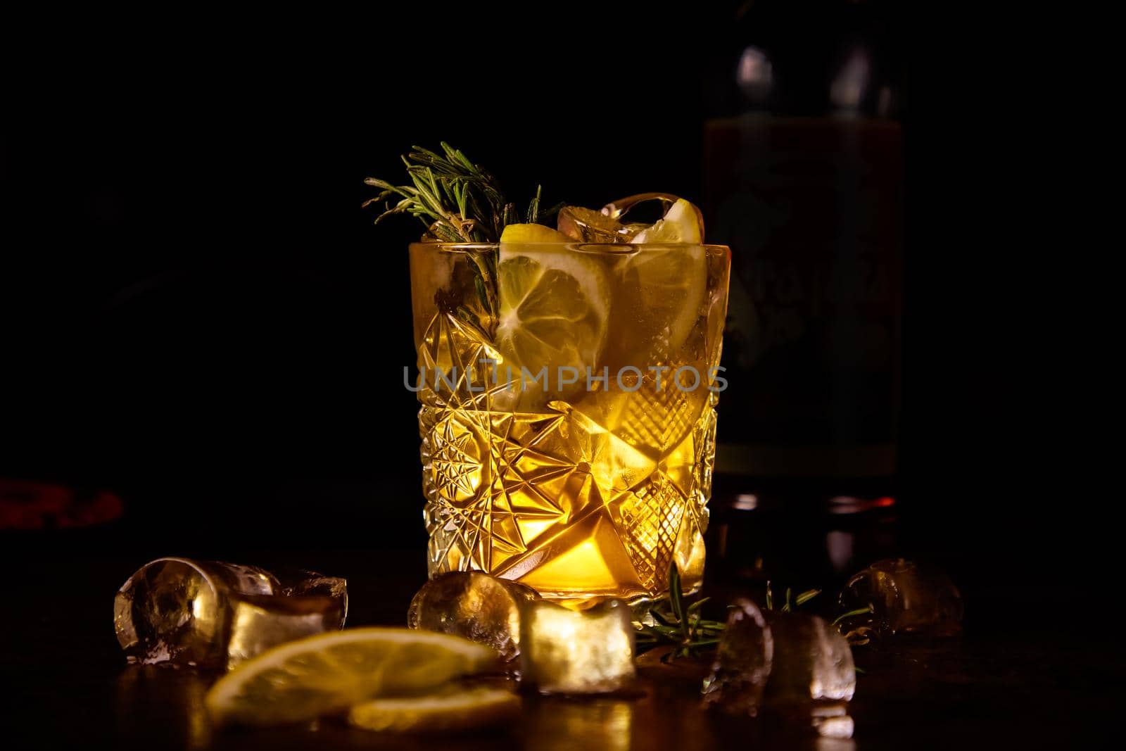 Red cocktail with lemon slice and Apple by Milanchikov