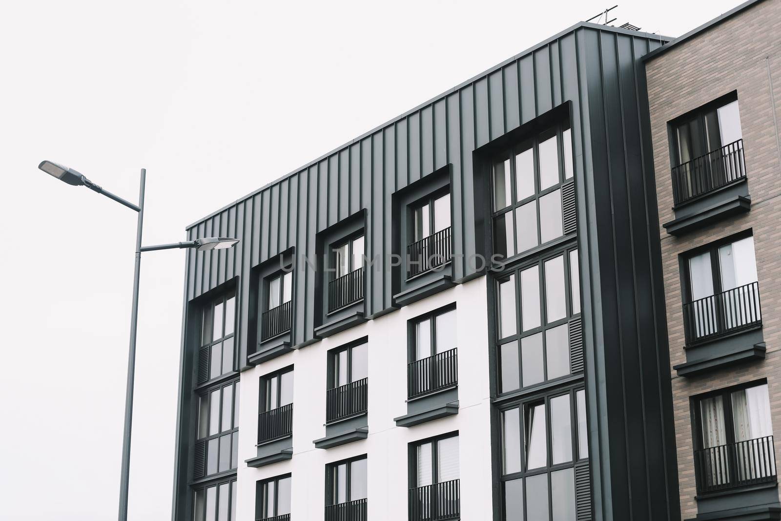 Exterior of typical modern apartment buildings. Abstract geometric background of modern architecture