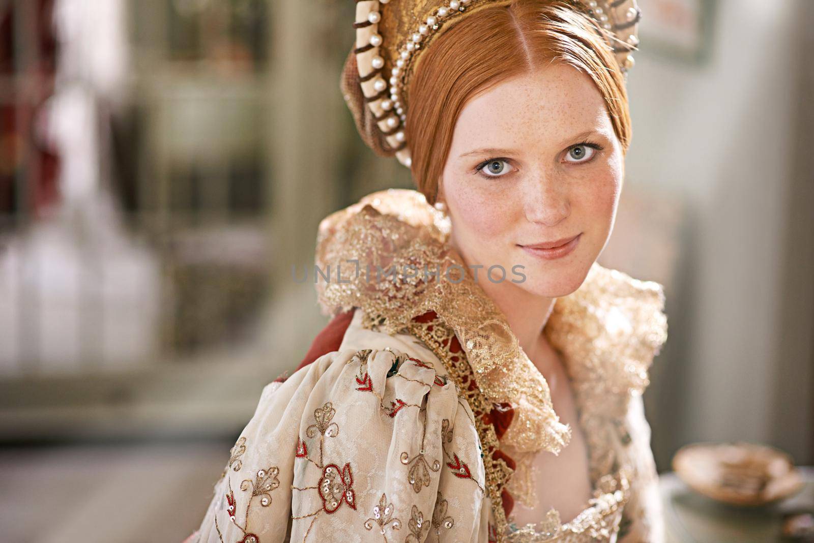 Noble beauty. Shot of an elegant noble woman in her palace room. by YuriArcurs