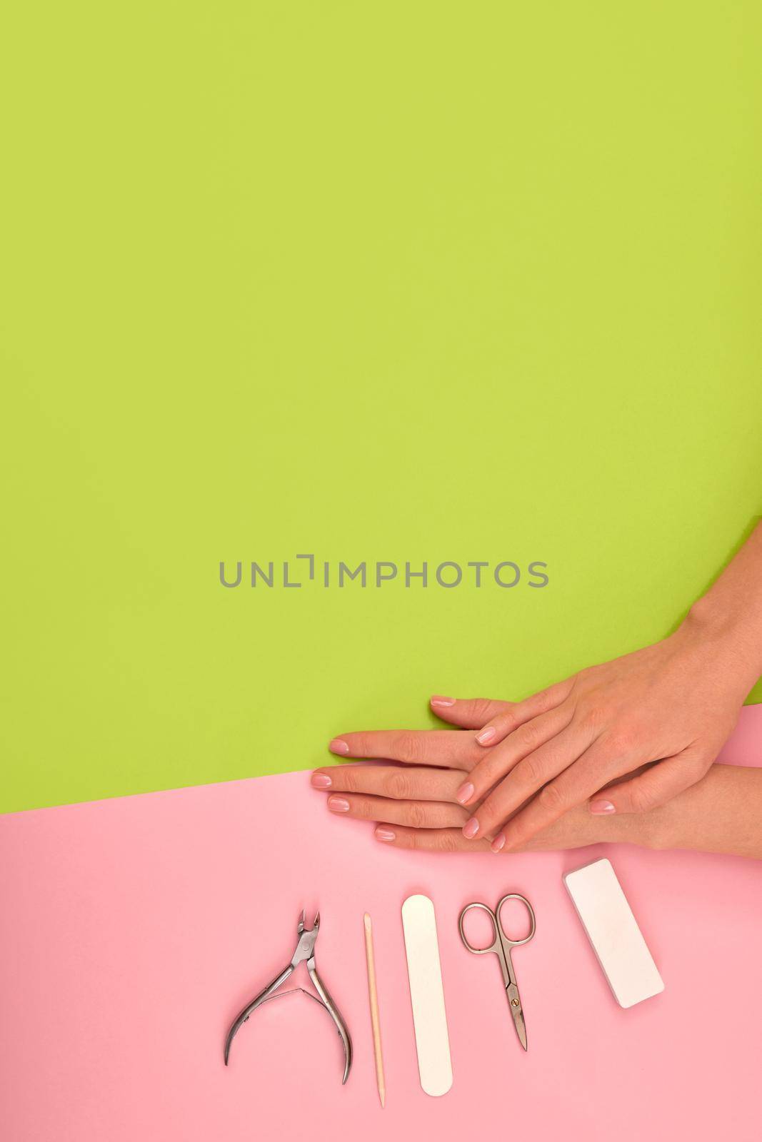 Female hands with beautiful manicure on color background by Demkat
