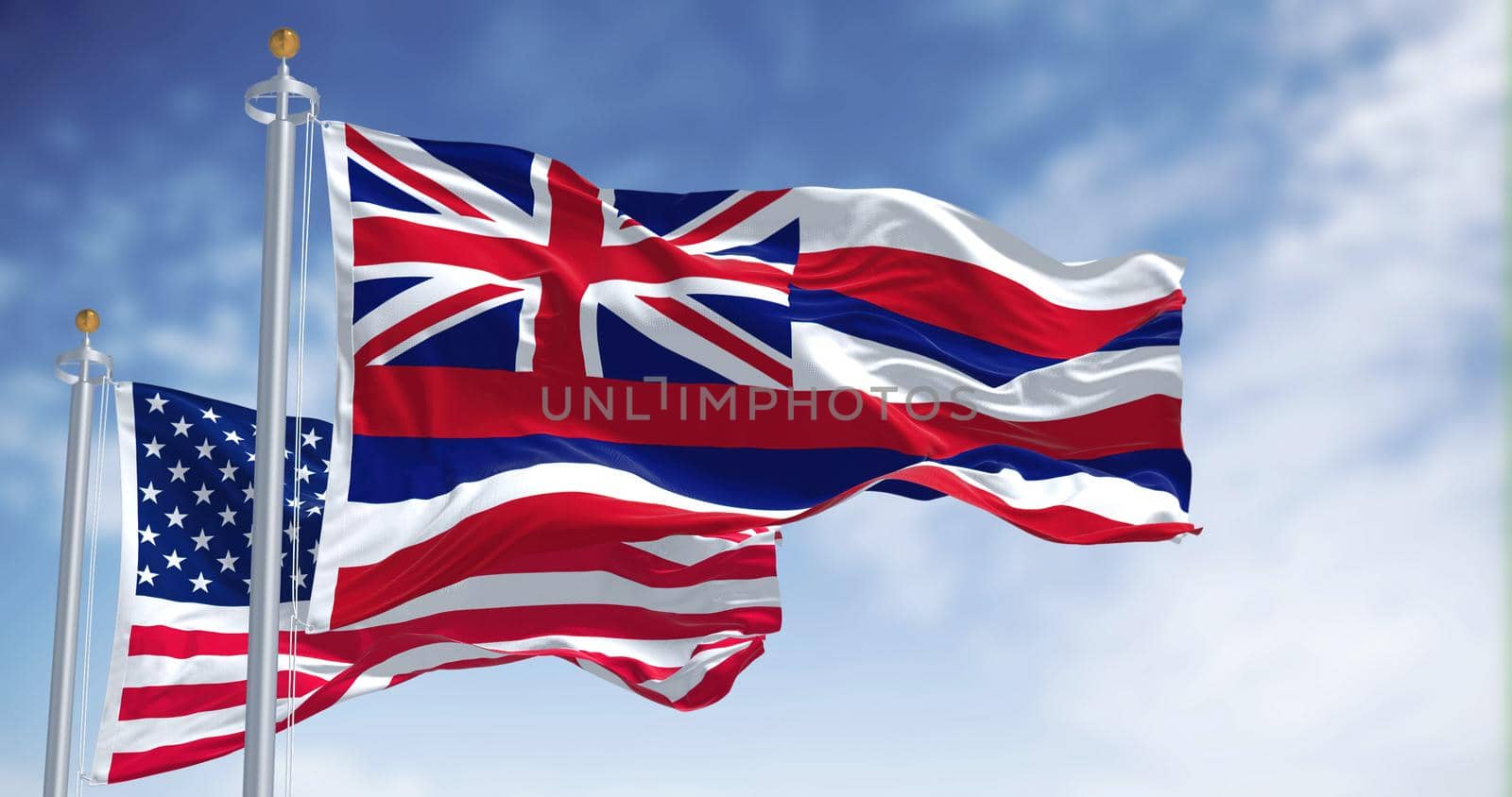 The Hawaii state flag waving along with the national flag of the United States of America. by rarrarorro