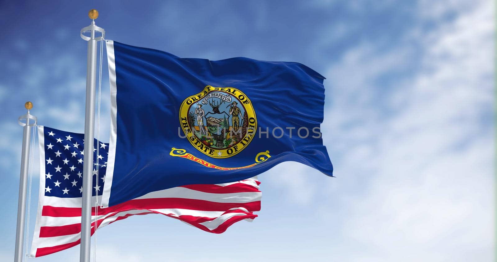 The Idaho state flag waving along with the national flag of the United States of America by rarrarorro