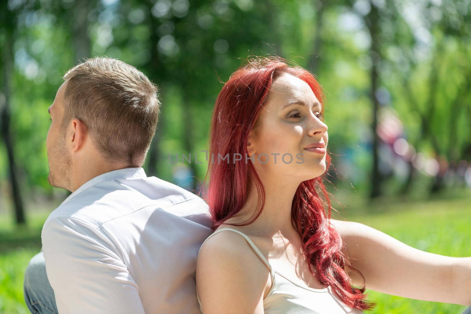 A young couple in the park. by adam121