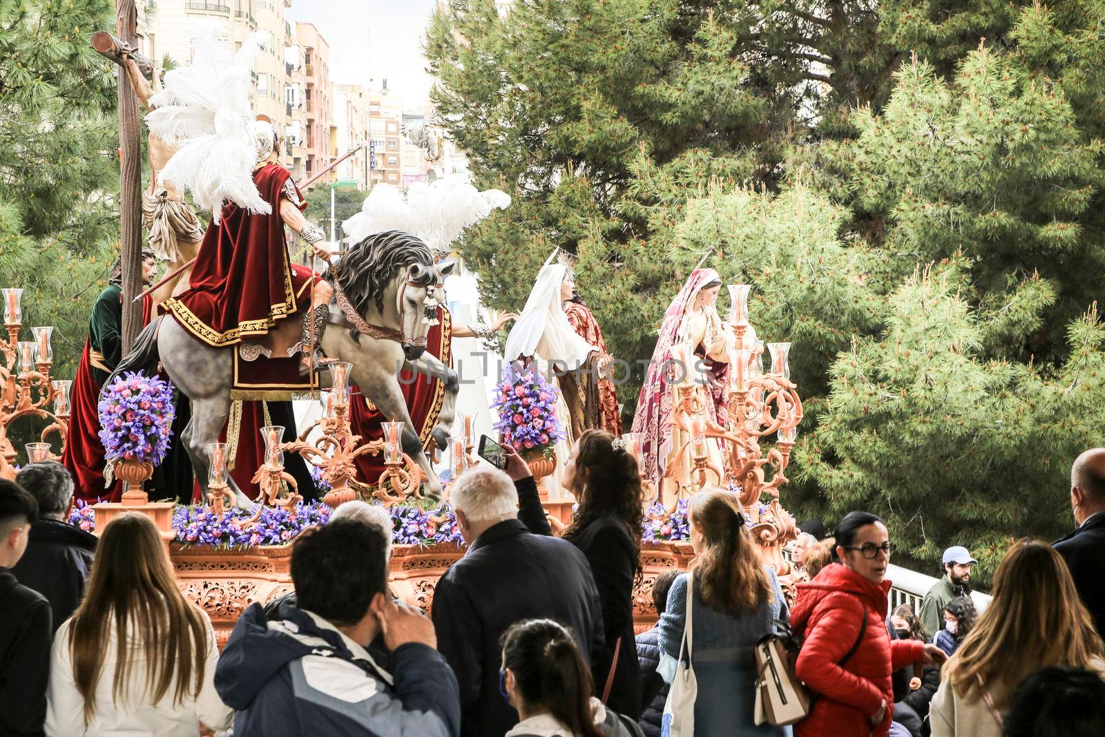 Elche, Spain- April 13, 2022: Easter Parade with bearers and penitents through the streets of Elche city in the Holy Week