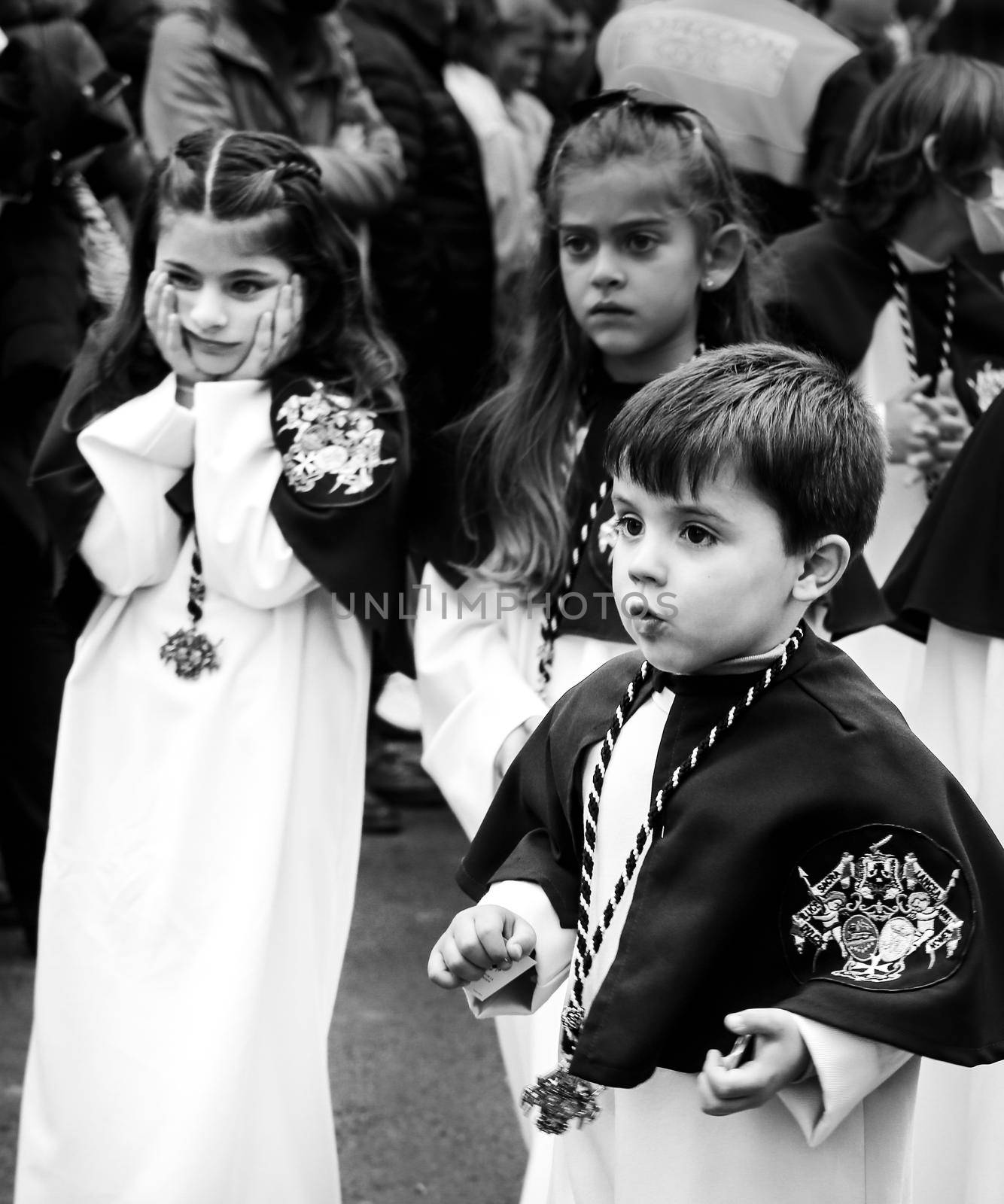 Children on Easter Parade in procession of Holy Week in Elche, Spain by soniabonet