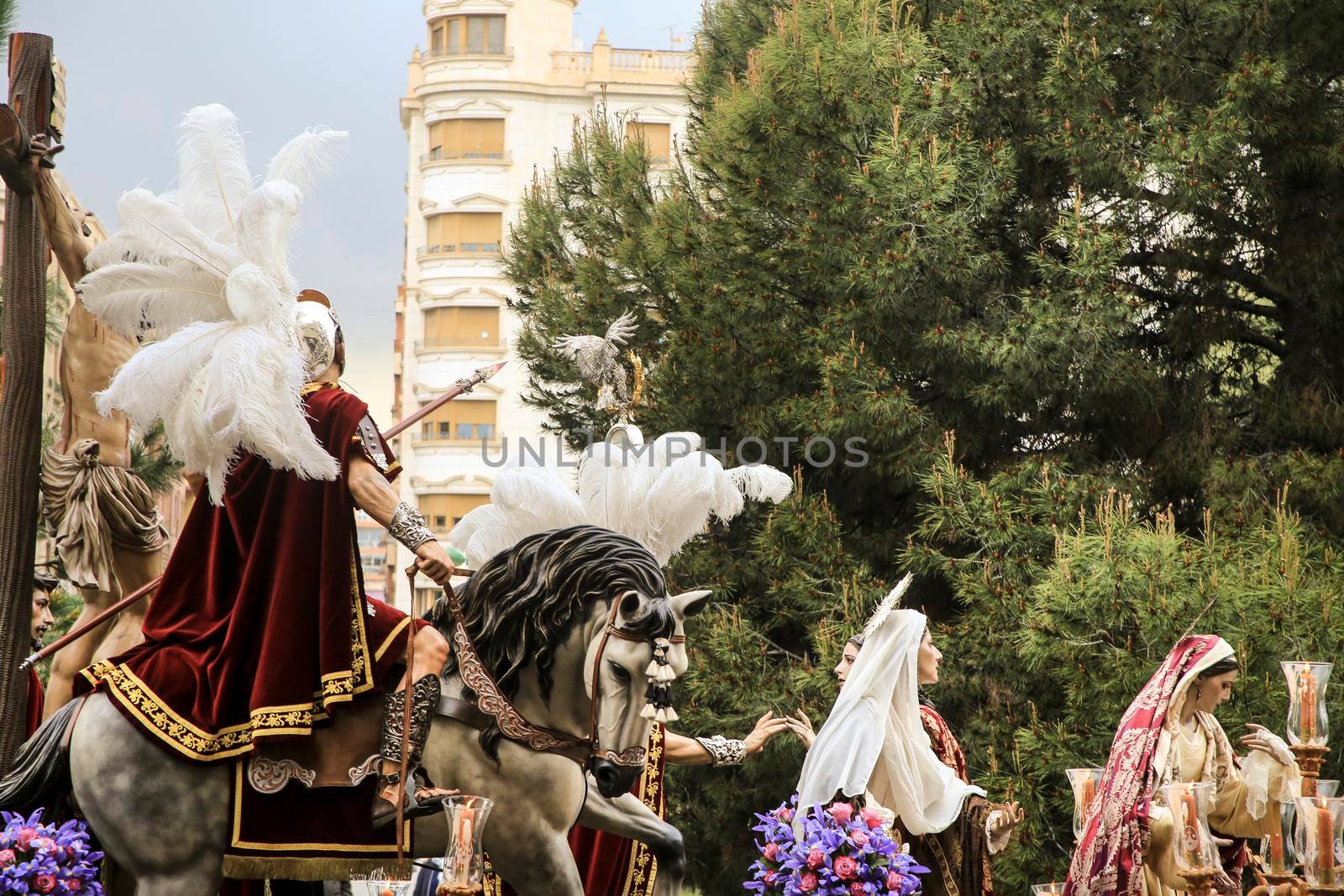 Elche, Spain- April 13, 2022: Easter Parade with bearers and penitents through the streets of Elche city in the Holy Week