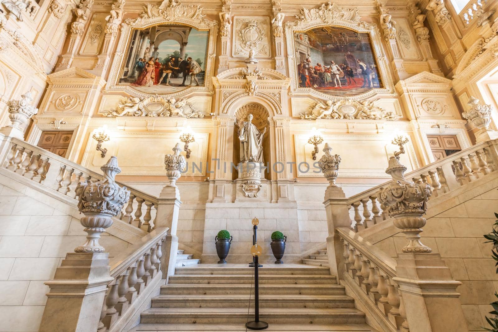 Turin, Italy - Circa August 2021: marble staircase in historic palace with luxury interior - Savoia Royal Palace