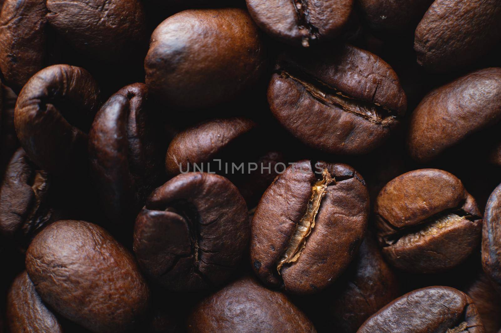 Coffee beans close up for background in shallow depth of field. macro photography.