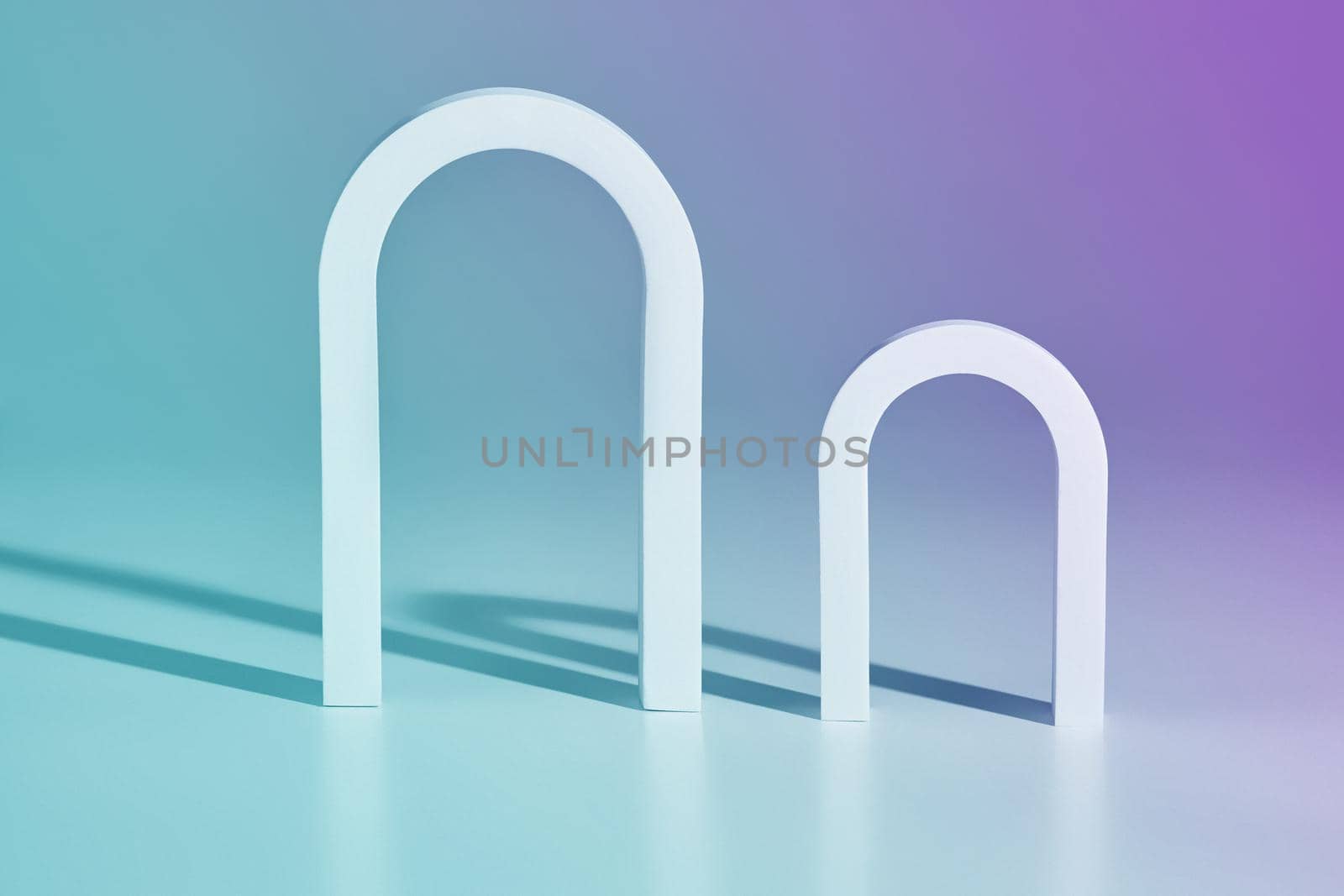 Two archways of different sizes on background with pastel blue-violet hues. Minimalist showcase for product presentation. 3D rendering
