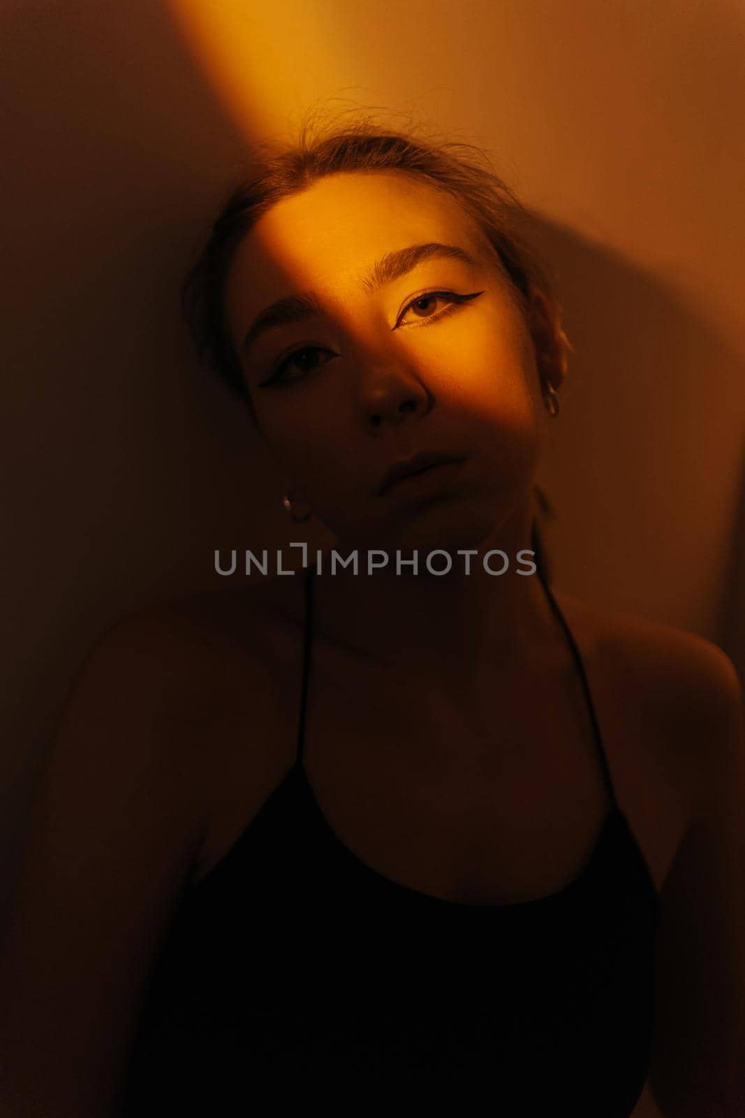 portrait of a young woman with spot light closeup