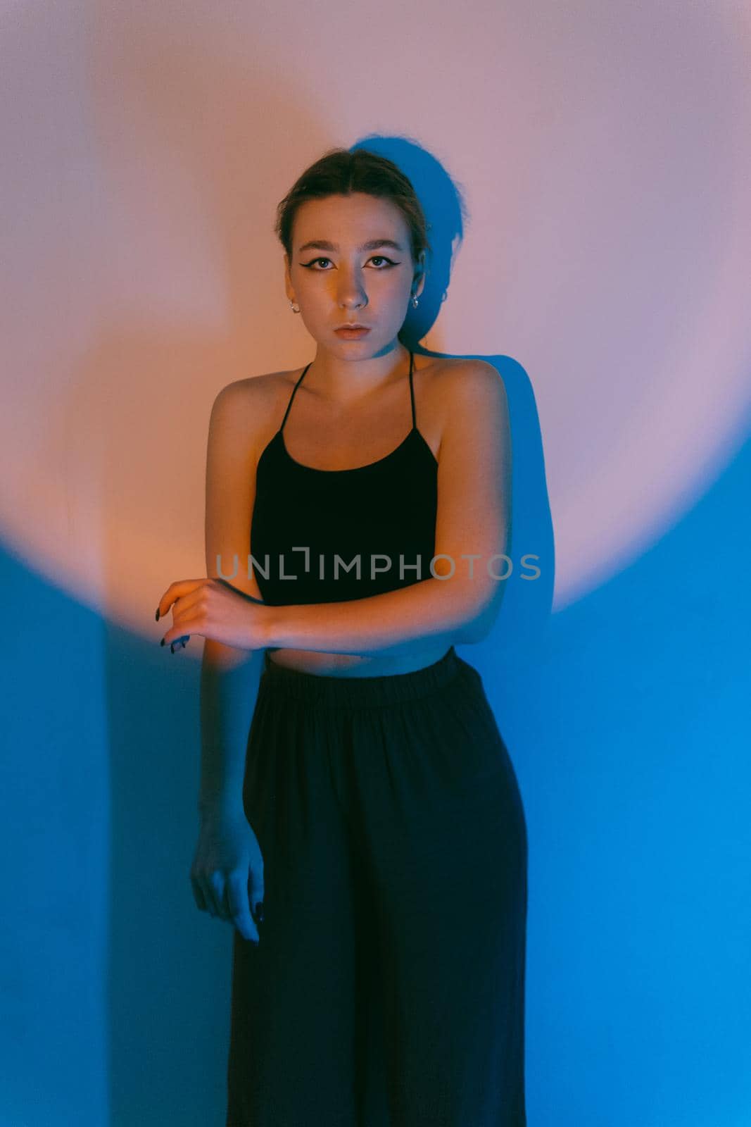 portrait of a young woman with spot light closeup