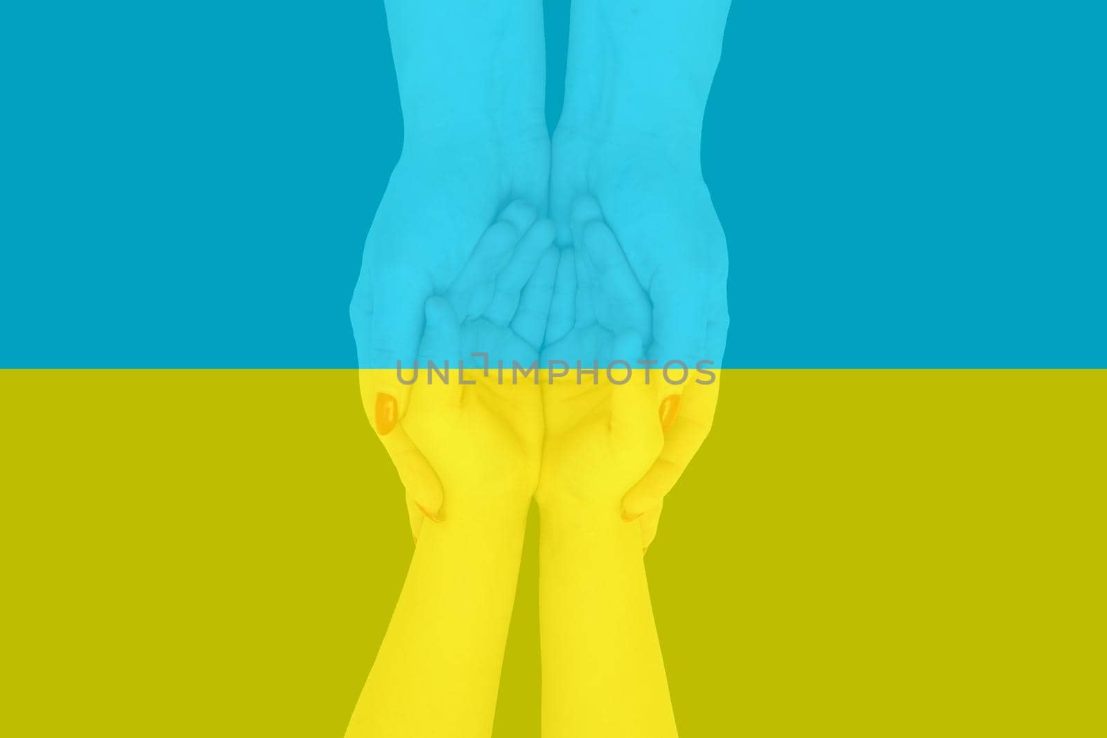 children's small hands hold female hands painted in yellow and blue colors of Ukrainian flag. Family together, peace, care. Support Ukrainians during the war on territory of Ukraine. by Andelov13