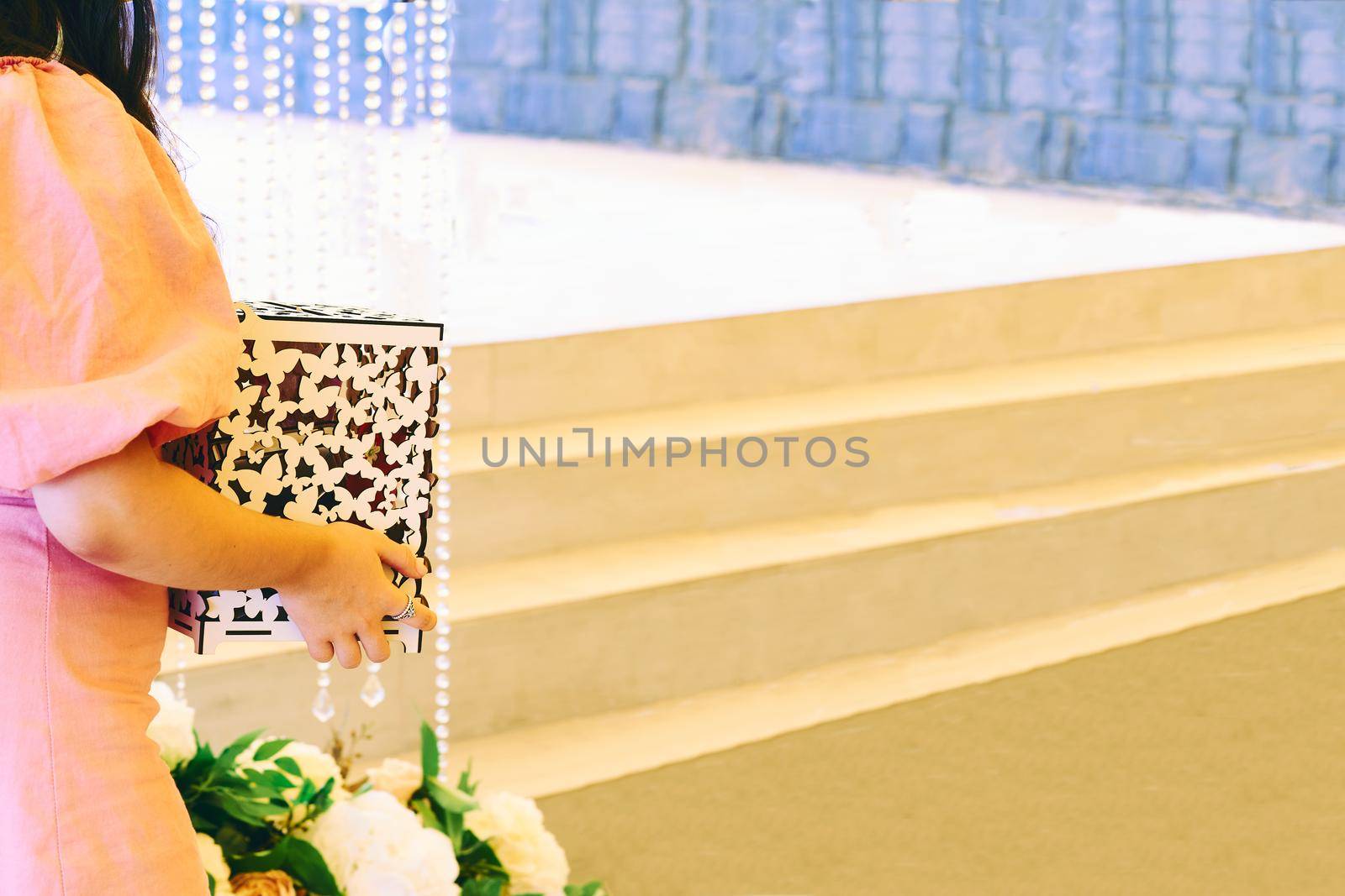 Wa marriage ceremony, especially considered as including the associated celebrations.itness at a wedding with a box for money and gifts. High quality photo