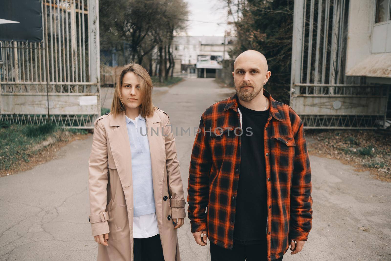 Loving caucasian blond couple walking at street