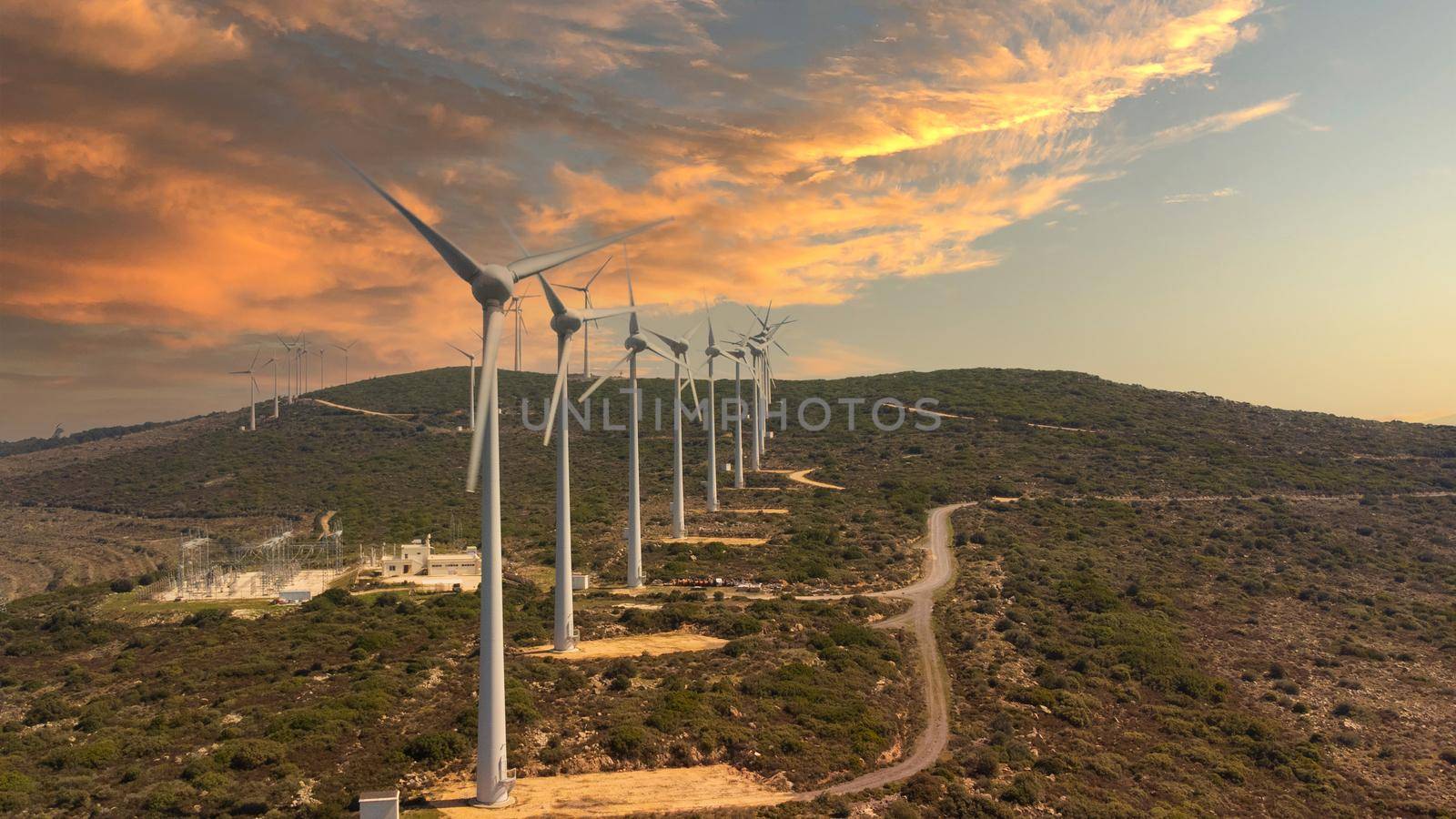 Windpower and agriculture. Wind turbines for electricity generation. Windmill renewable energy farm. Eco-energy of nature. High quality photo