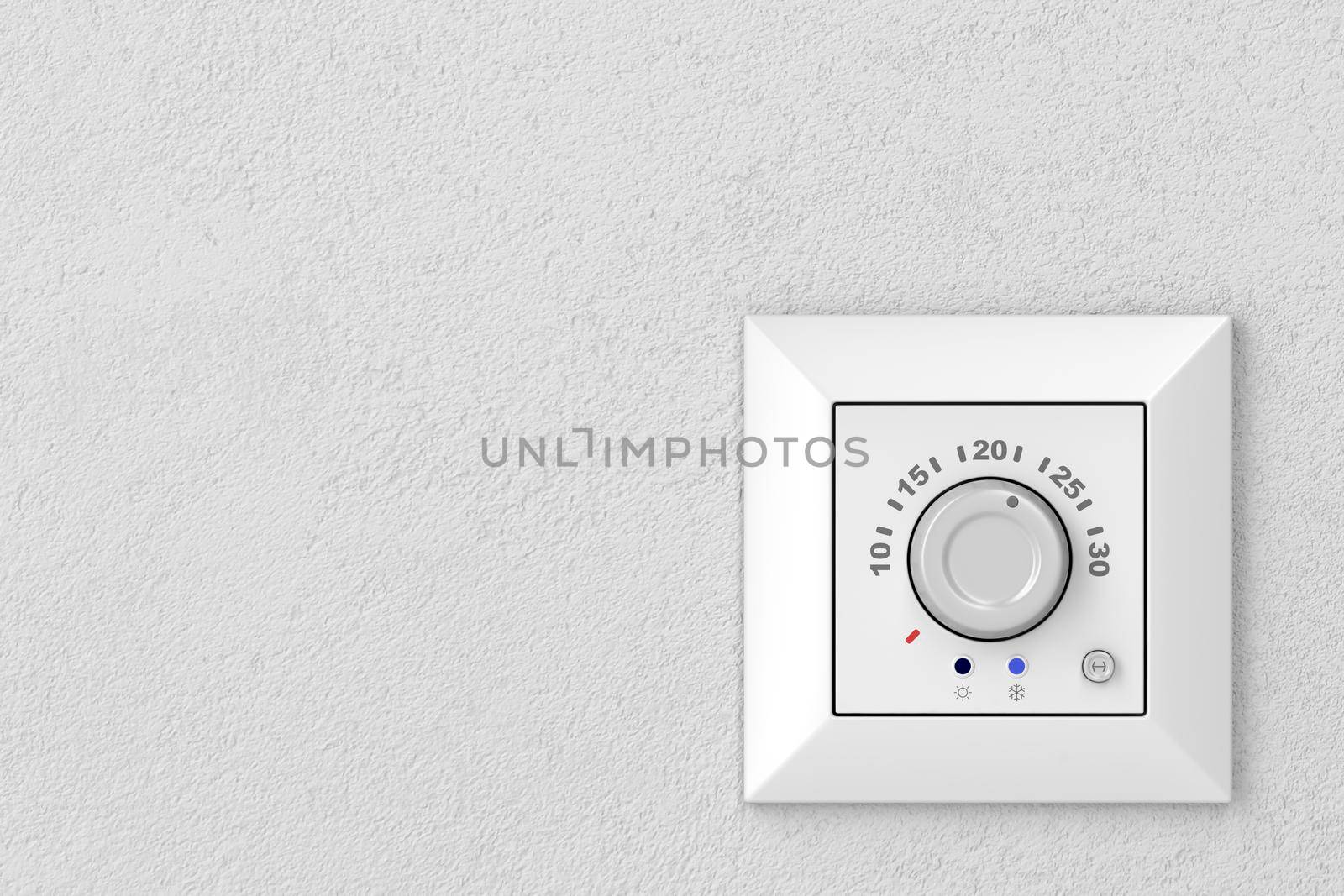 Air conditioner control panel (thermostat) on a gray wall