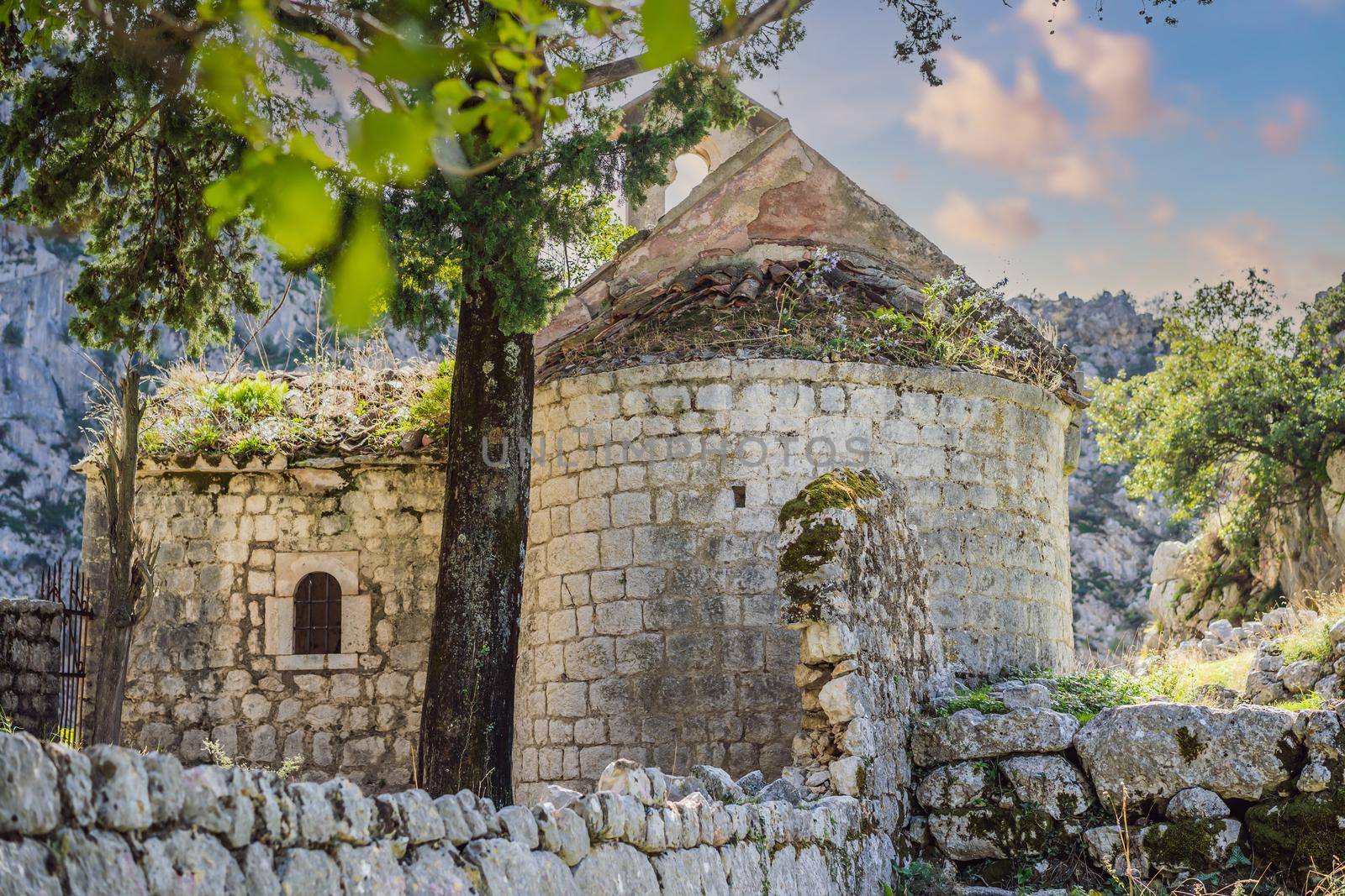 Abandoned historic church of St. George near the town of Kotor. Montenegro by galitskaya