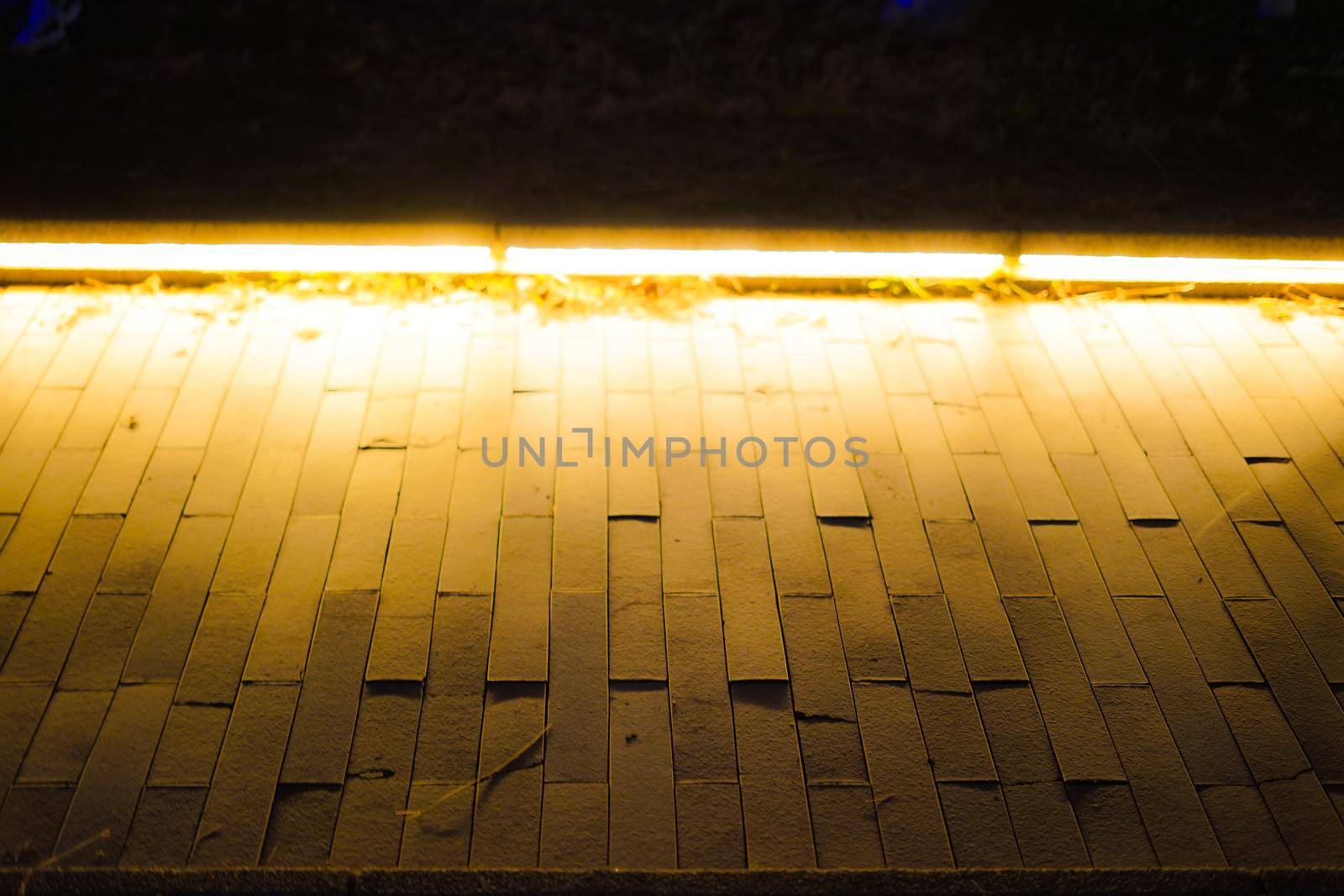 Orange illuminated brick sidewalk. Shooting Location: Yokohama-city kanagawa prefecture