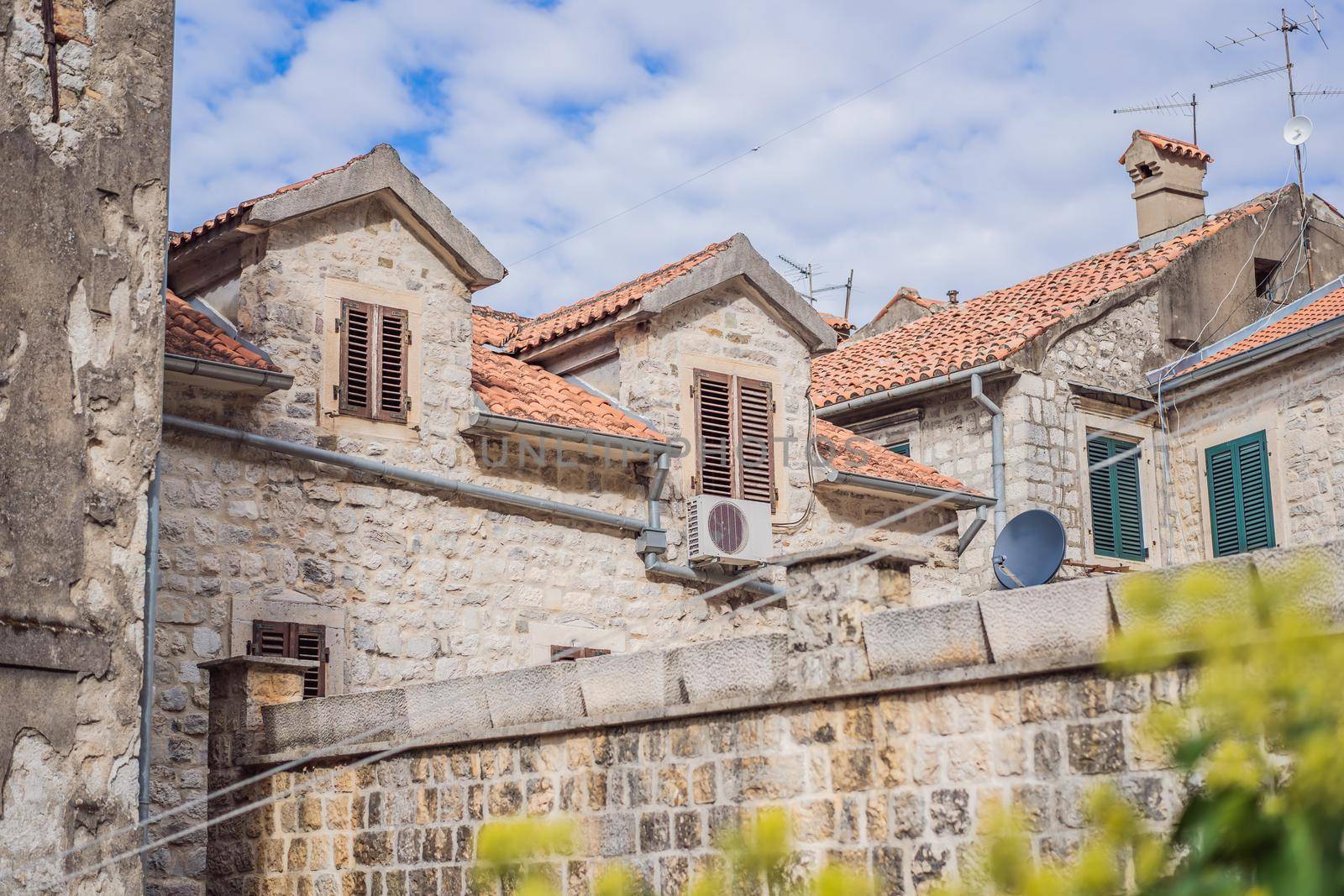 Colorful street in Old town of Kotor on a sunny day, Montenegro.