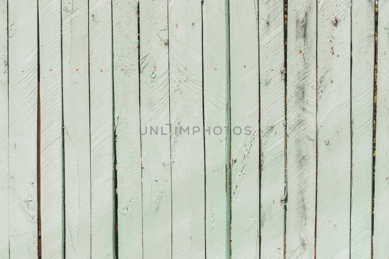 Old wooden background of boards with cracked and peeling paint. Wooden texture.