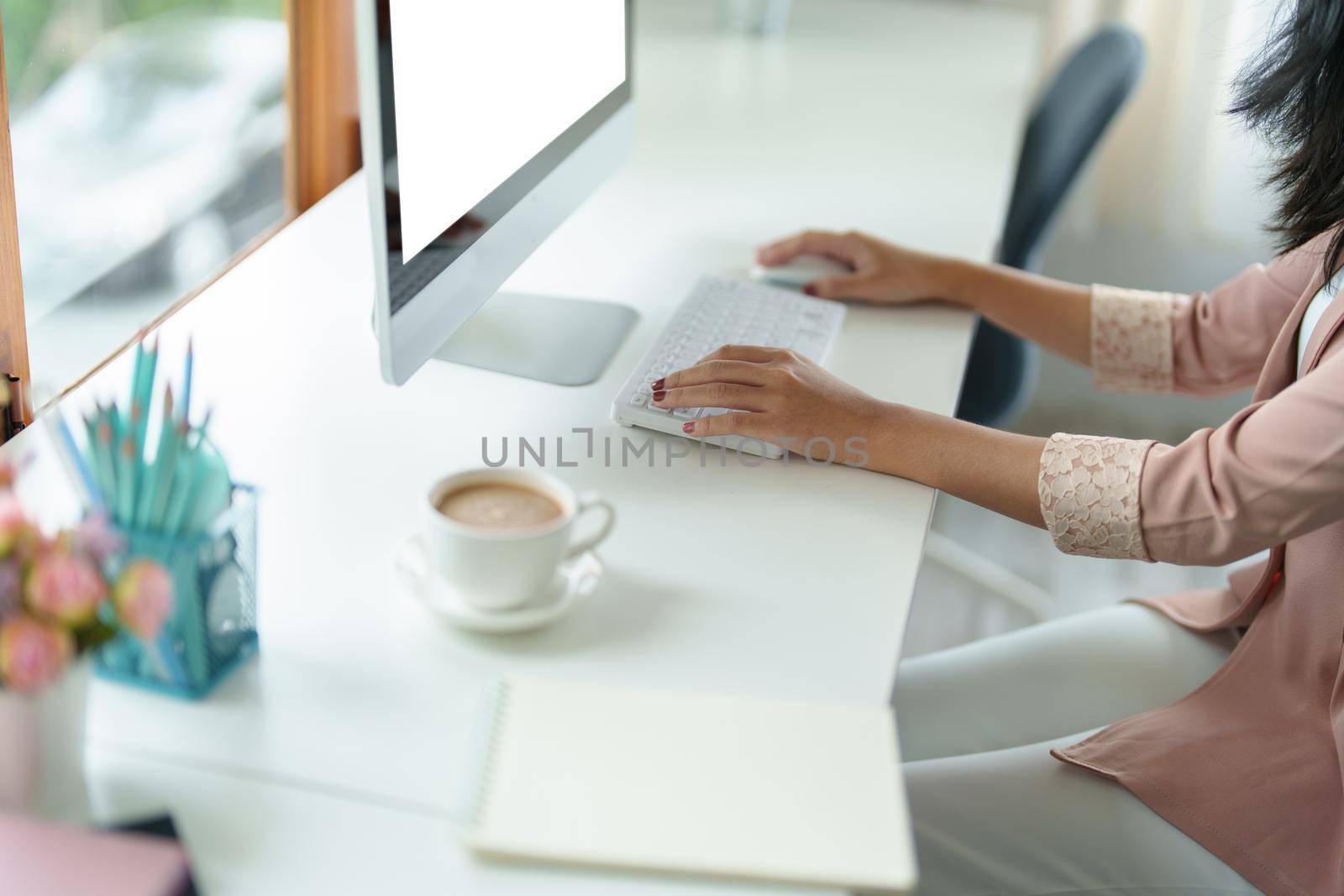 shopping, meeting, information searching, Asian woman using a white screen laptop mockup can insert text, characters or images. by Manastrong