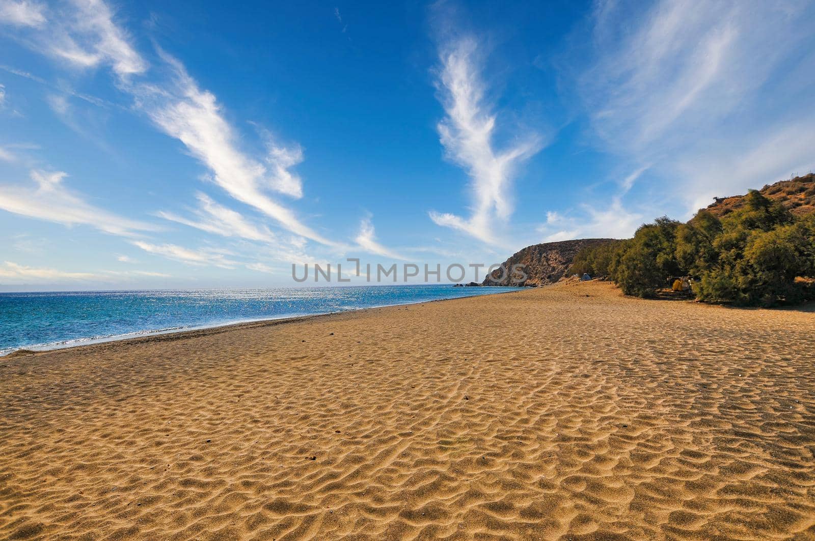 Golden sand in the beach of Roukounas in Anafi island of Greece