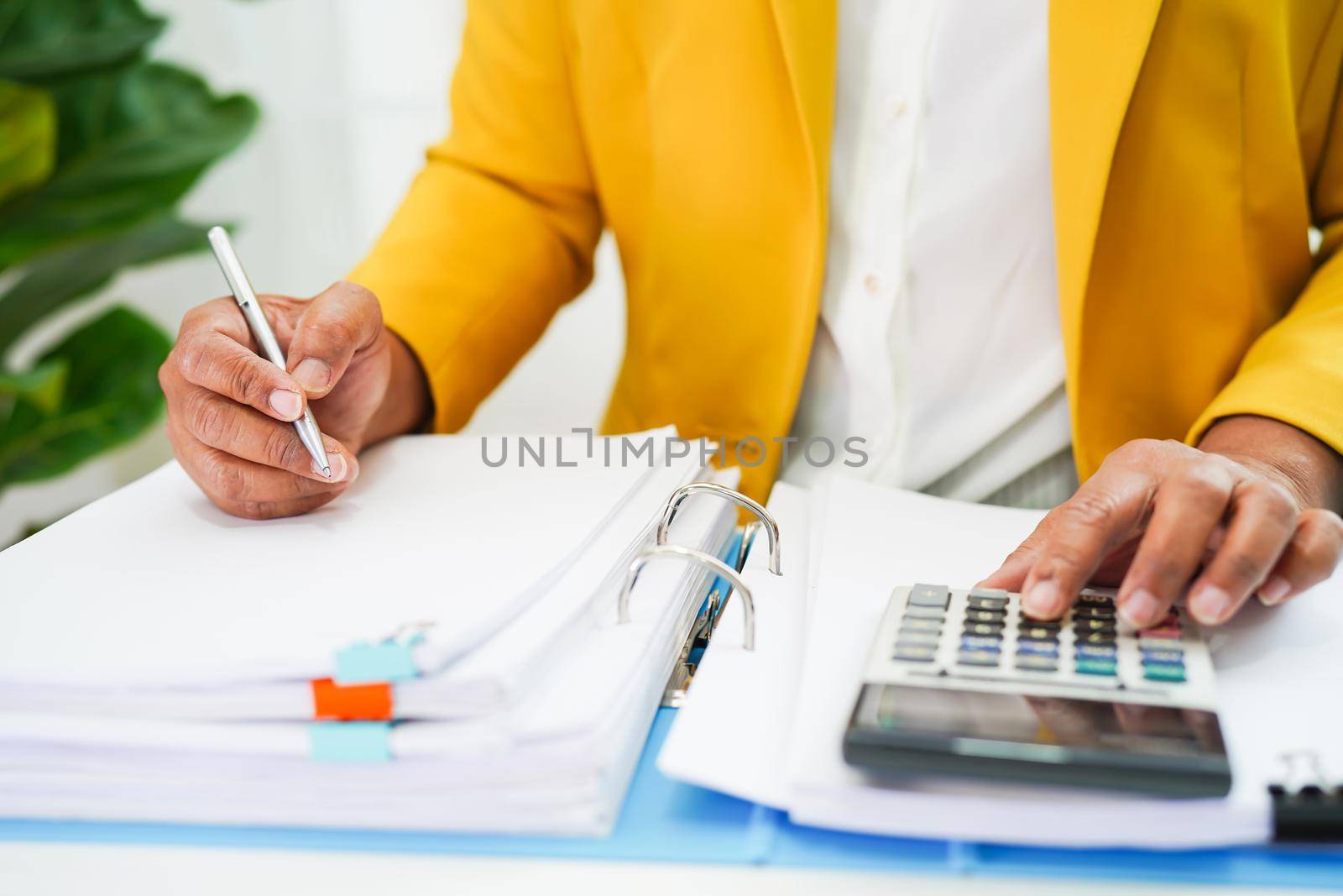 Businessman working and analysis with statistic graph in office.