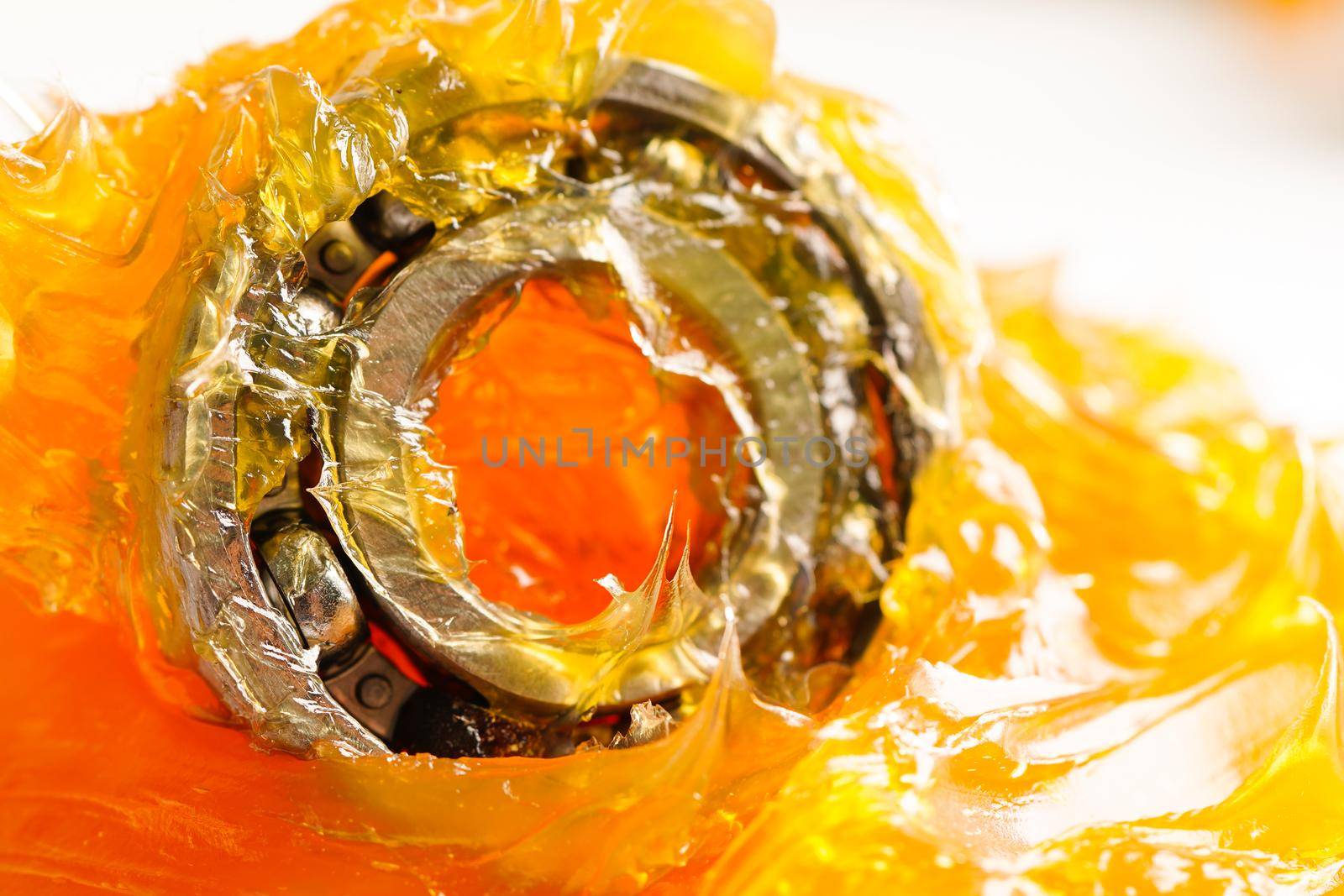 Grease and ball bearing, lithium machinery lubrication for automotive and industrial.