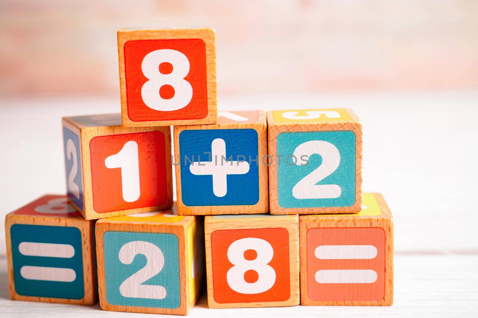 Number wood block cubes for learning Mathematic, education math concept.