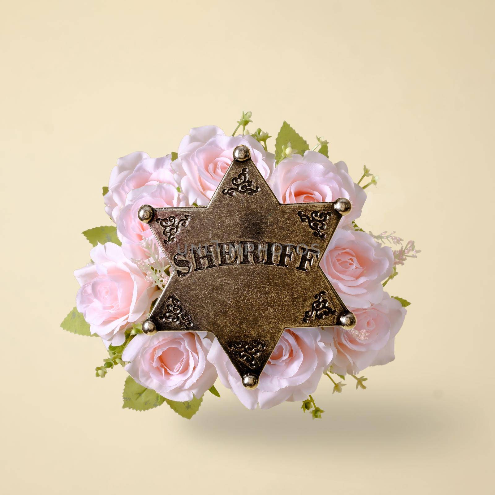 Star detective security america sheriff symbol of protecting the law in the wild west and a bouquet of rose flowers. Creative minimal concept.