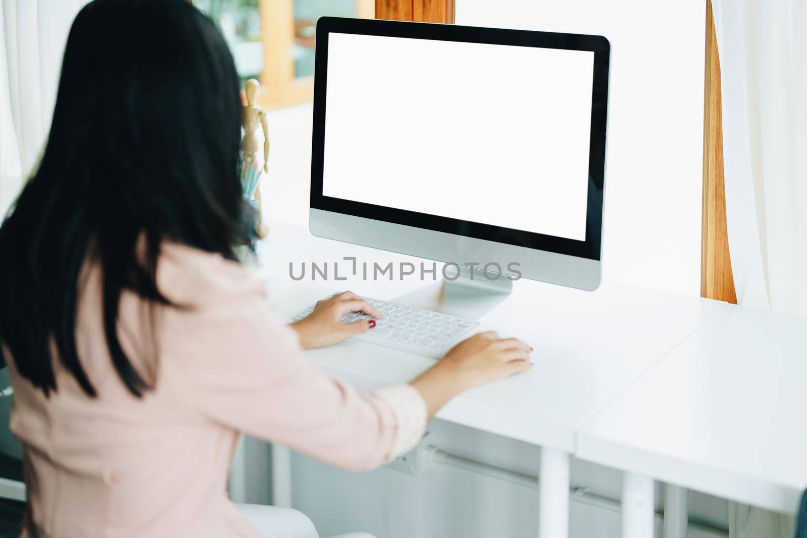 shopping, meeting, information searching, Asian woman using a white screen laptop mockup can insert text, characters or images. by Manastrong