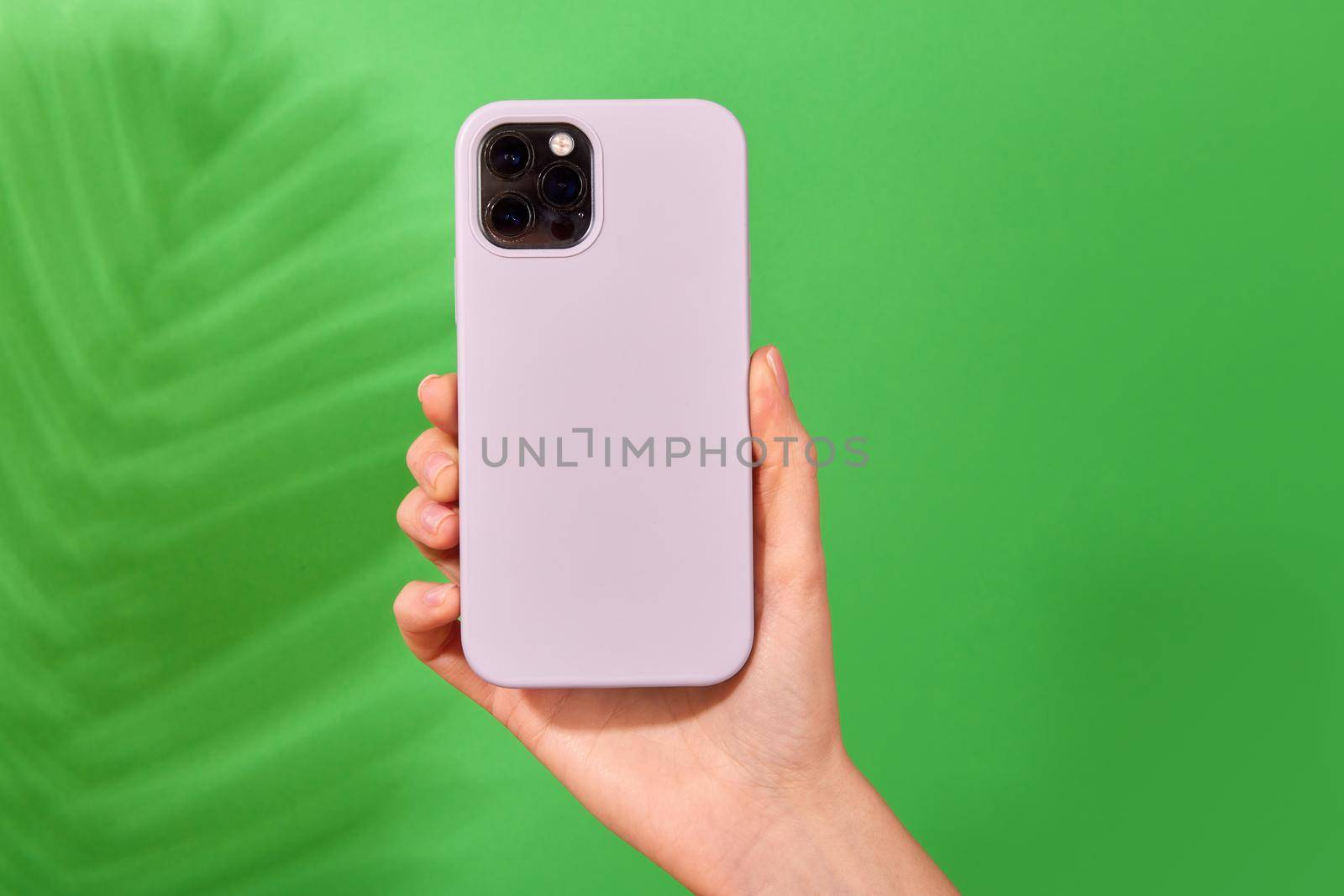 Hands holding a smartphone in a case by Demkat