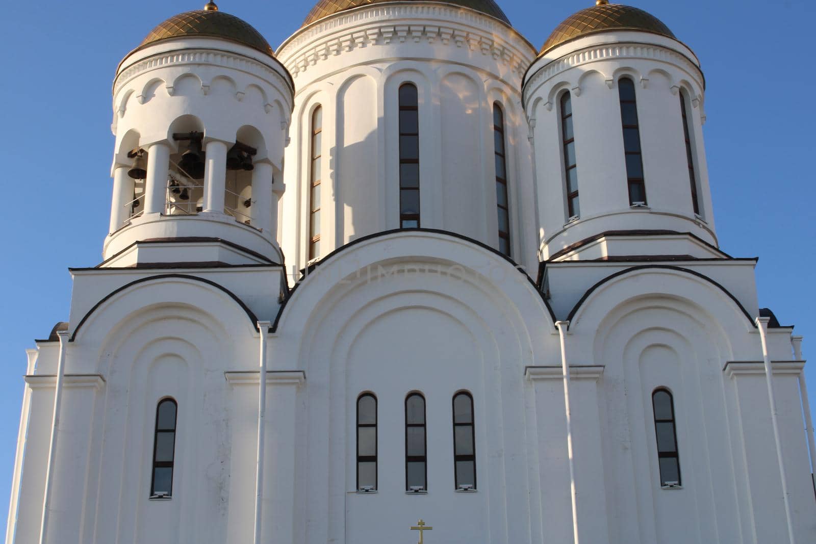 The church is made of white stone. Religion. Orthodoxy. Architecture. High quality photo